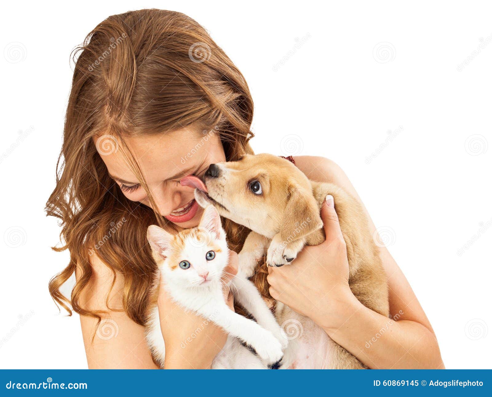 happy girl with kitten and affectionate puppy