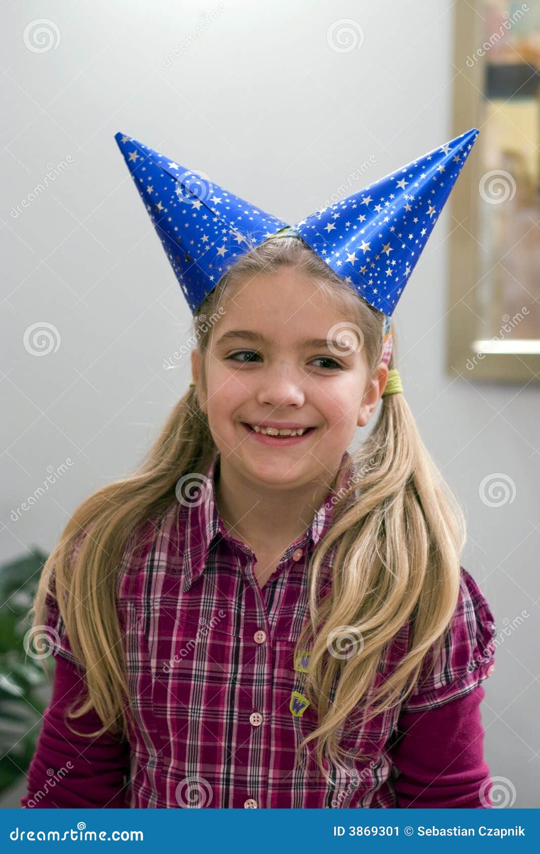 Happy girl in party hats stock image. Image of looking 3869301