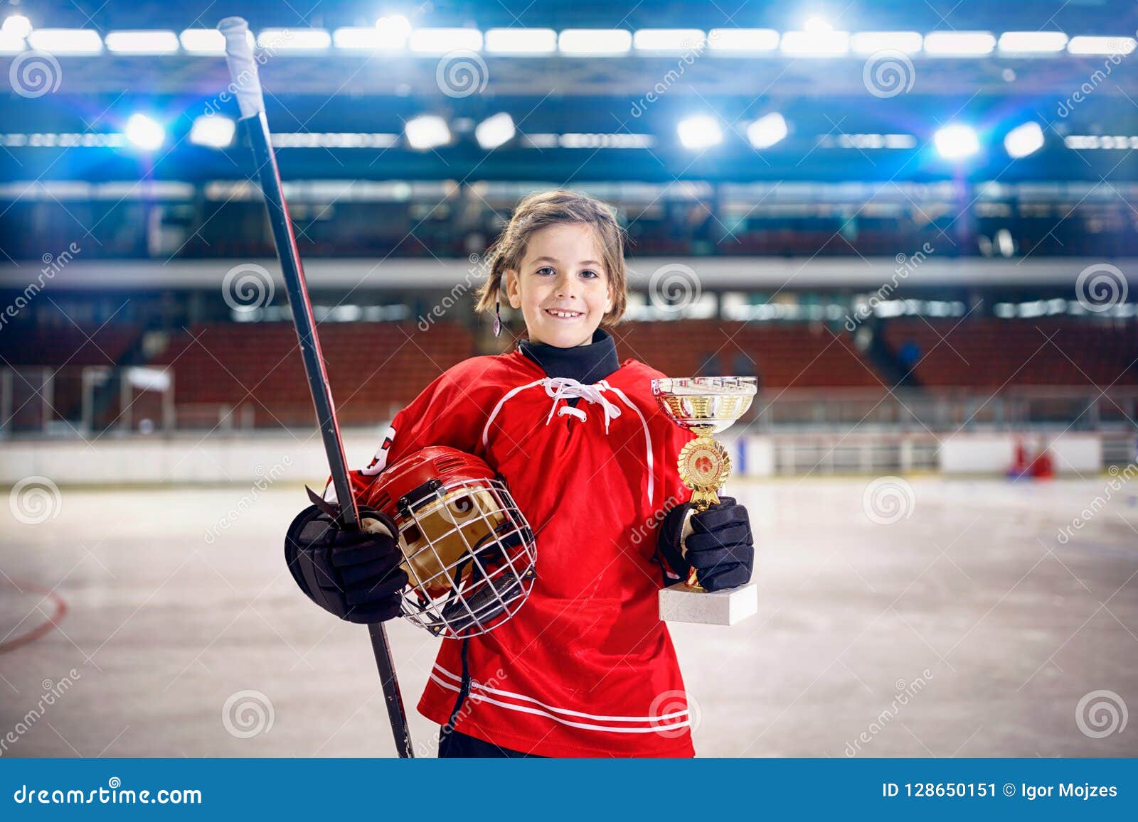 happy girl player ice hockey winner trophy