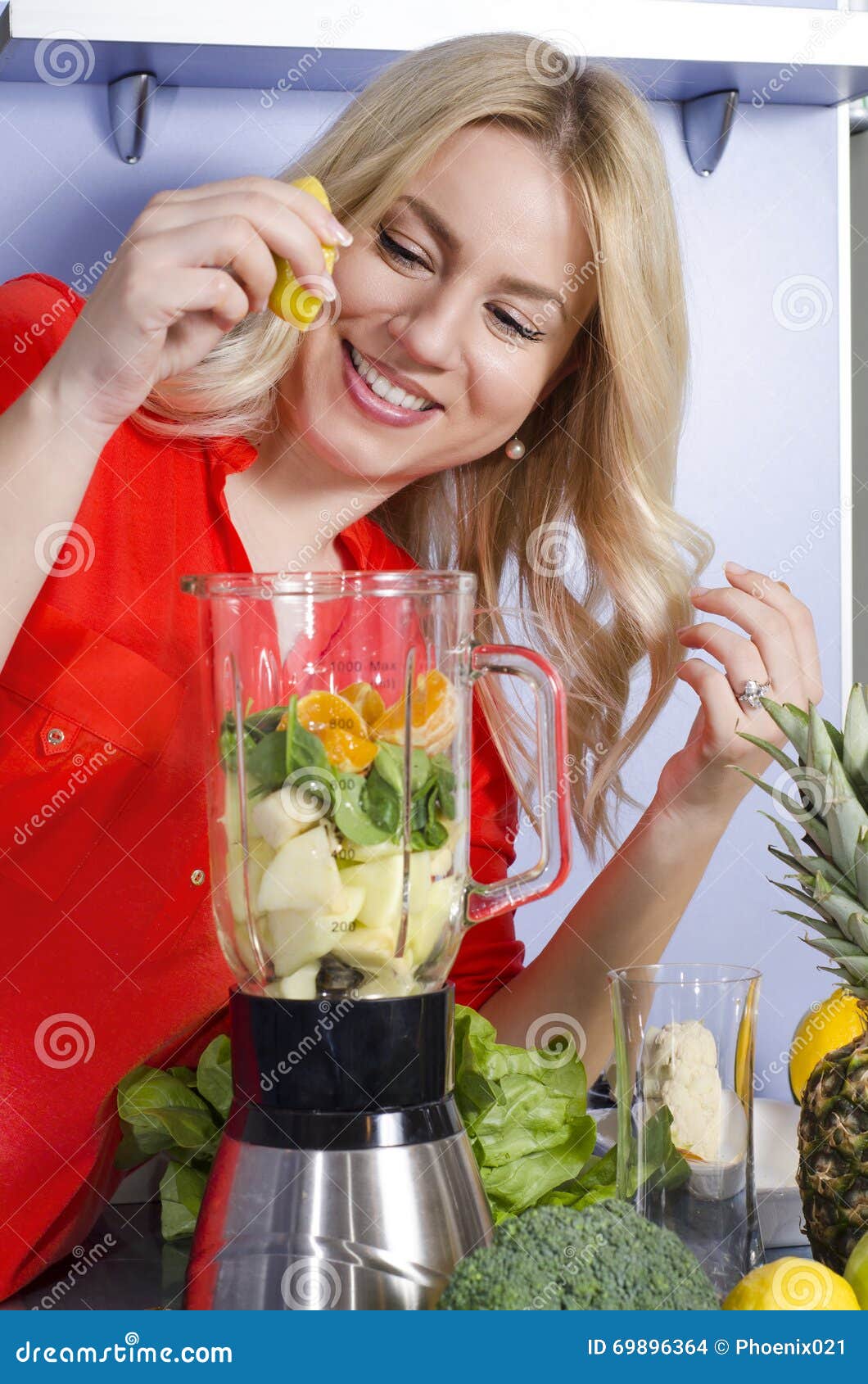 Happy Girl Squeezing Lemon into Juicer Stock Photo Image of indoors