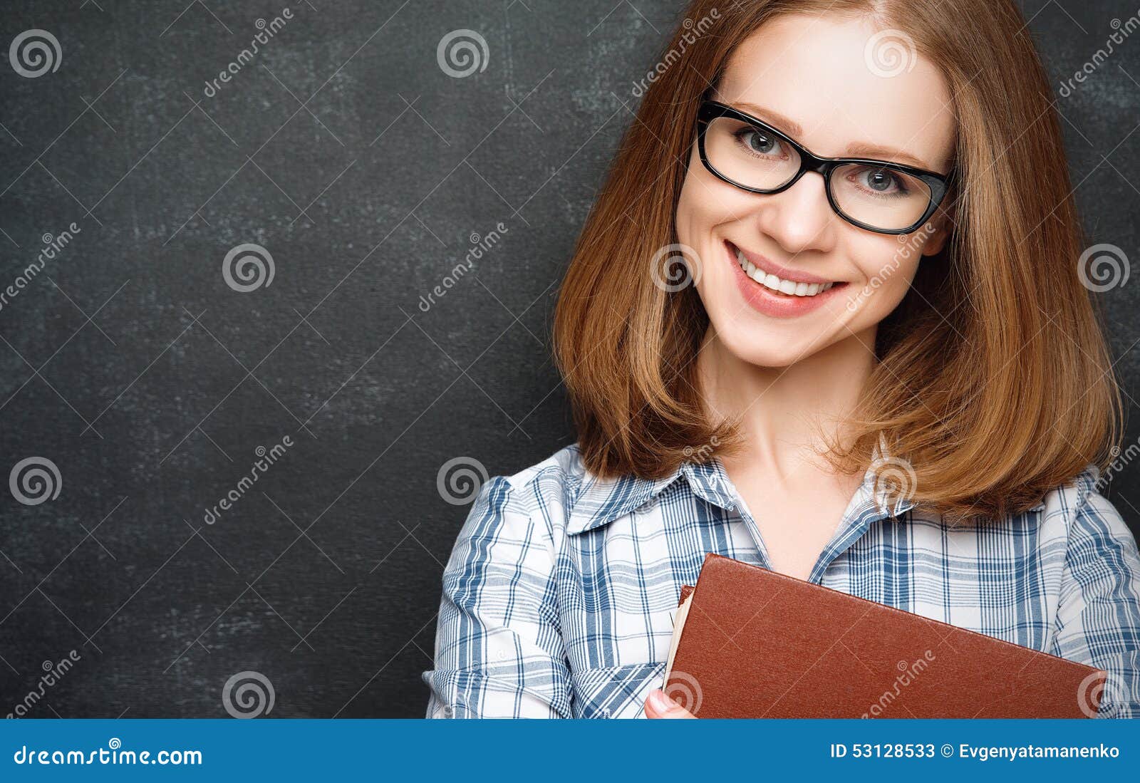 Happy Girl Student with Glasses and Book from Blackboard Stock Image