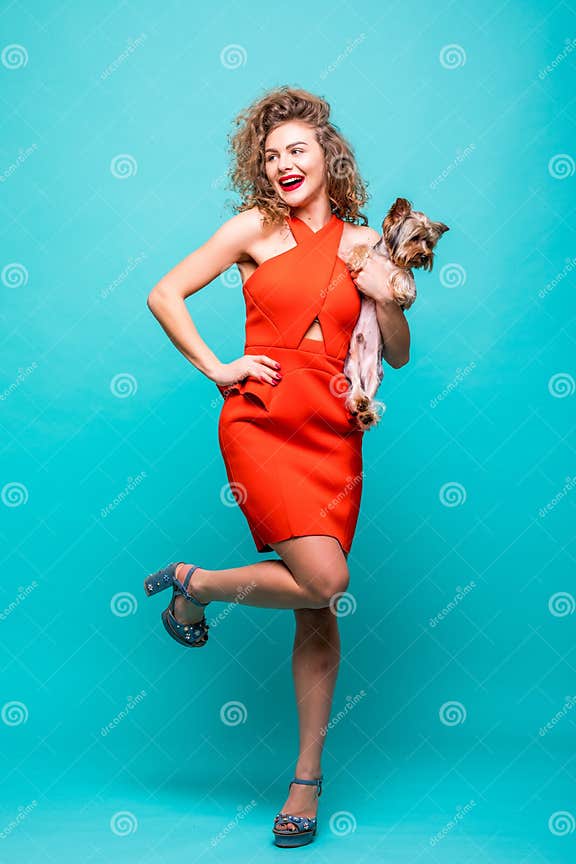 Happy Girl Wear In Red Dress Hug And Posing With Her Lovely Yorkshire