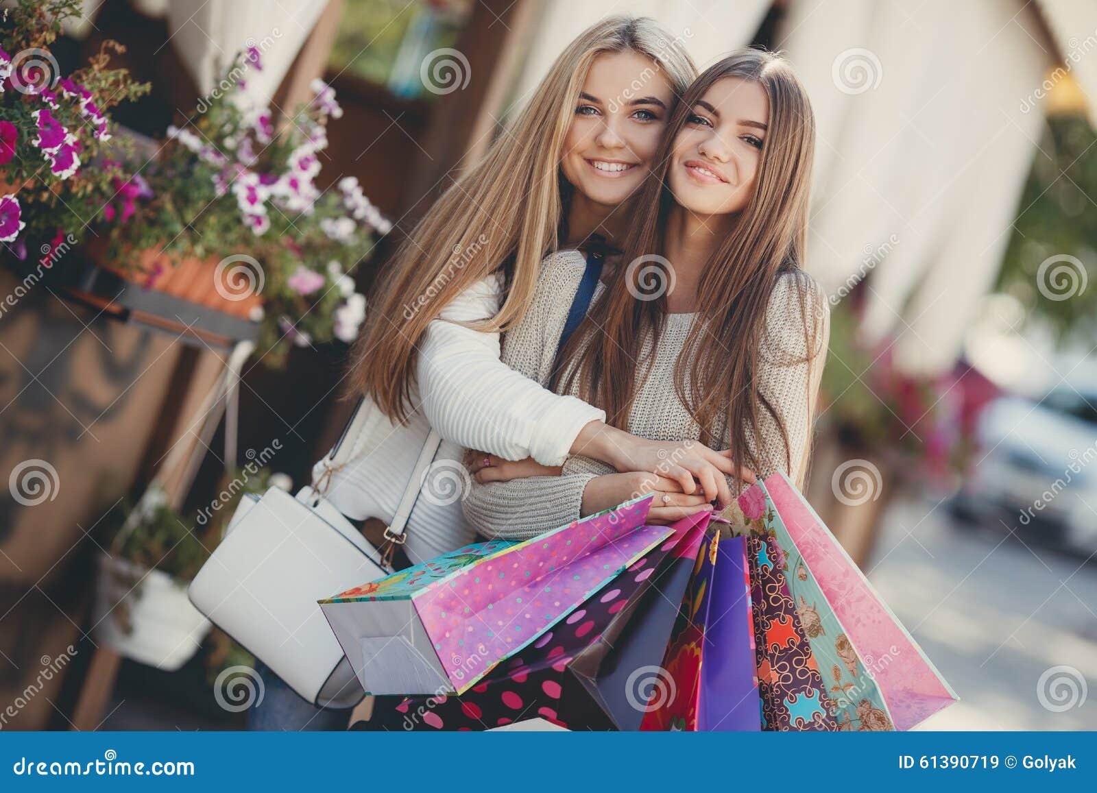 Happy Girlfriends Go Shopping At The Mall Stock Image Image Of Consumerism Holding