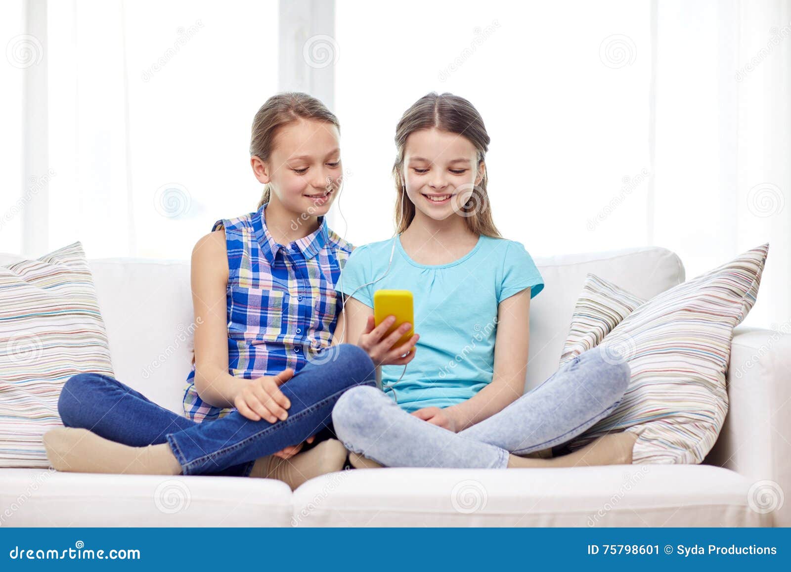 Happy Girls with Smartphone Sitting on Sofa Stock Image - Image of ...