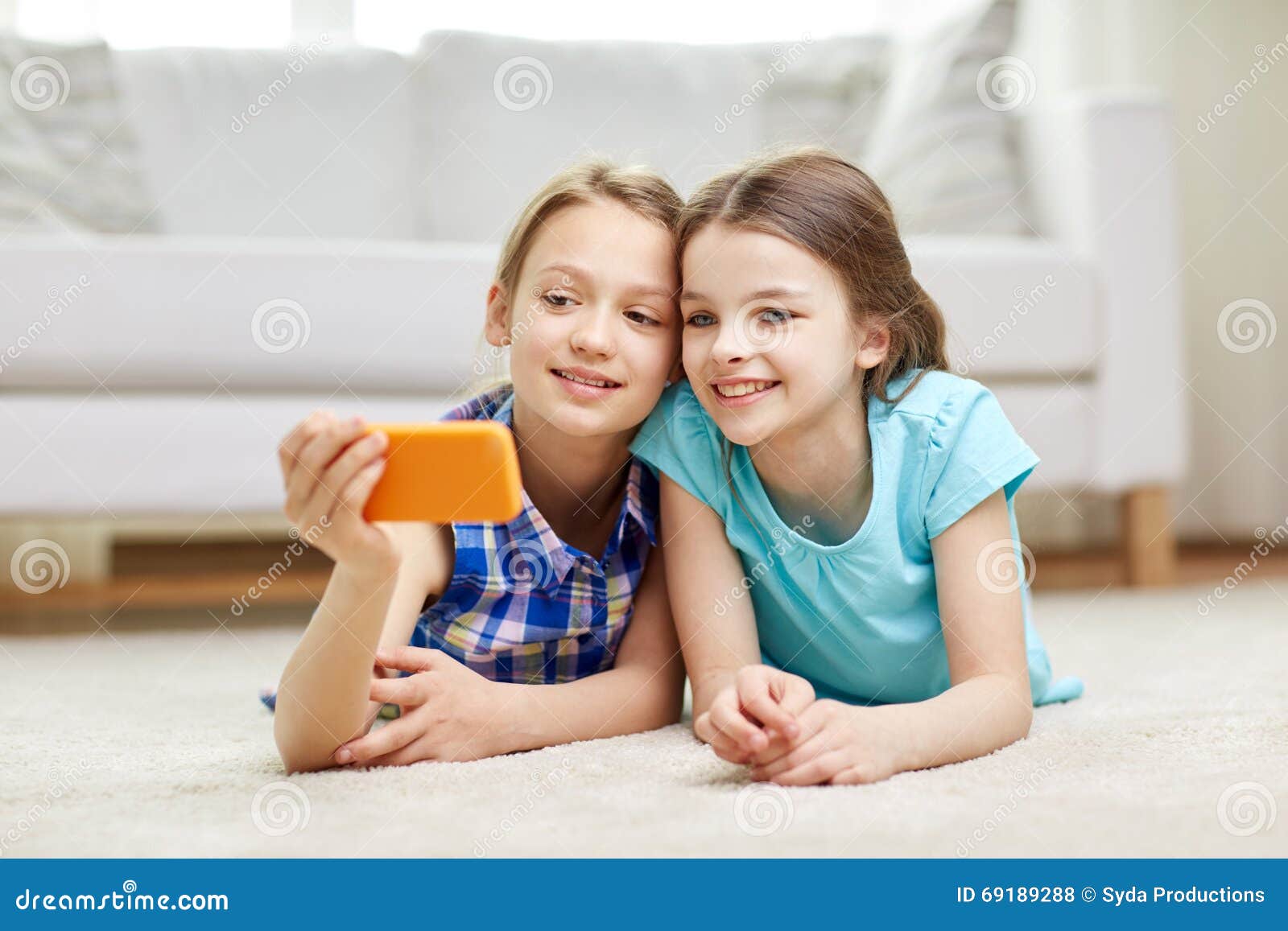 Happy Girls with Smartphone Taking Selfie at Home Stock Photo - Image ...