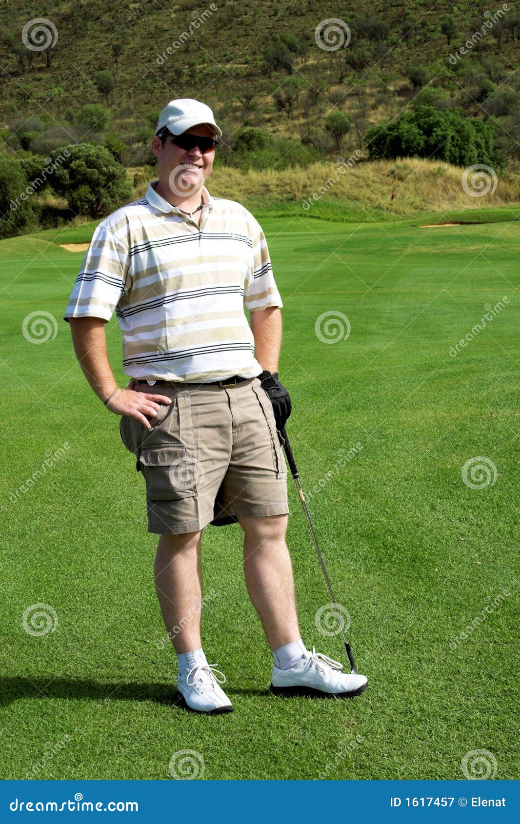 Happy golfer stock image. Image of strike, grassy, golf - 1617457