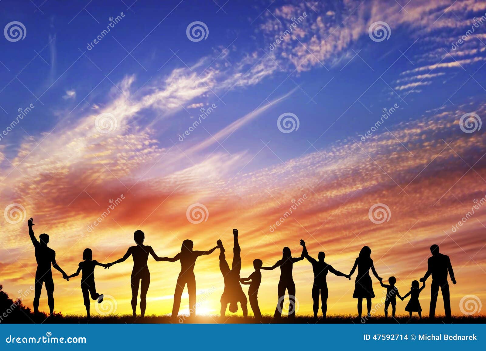 happy-group-diverse-people-friends-family-together-team-standing-holding-hands-celebrating-success-sunset-sky-47592714.jpg