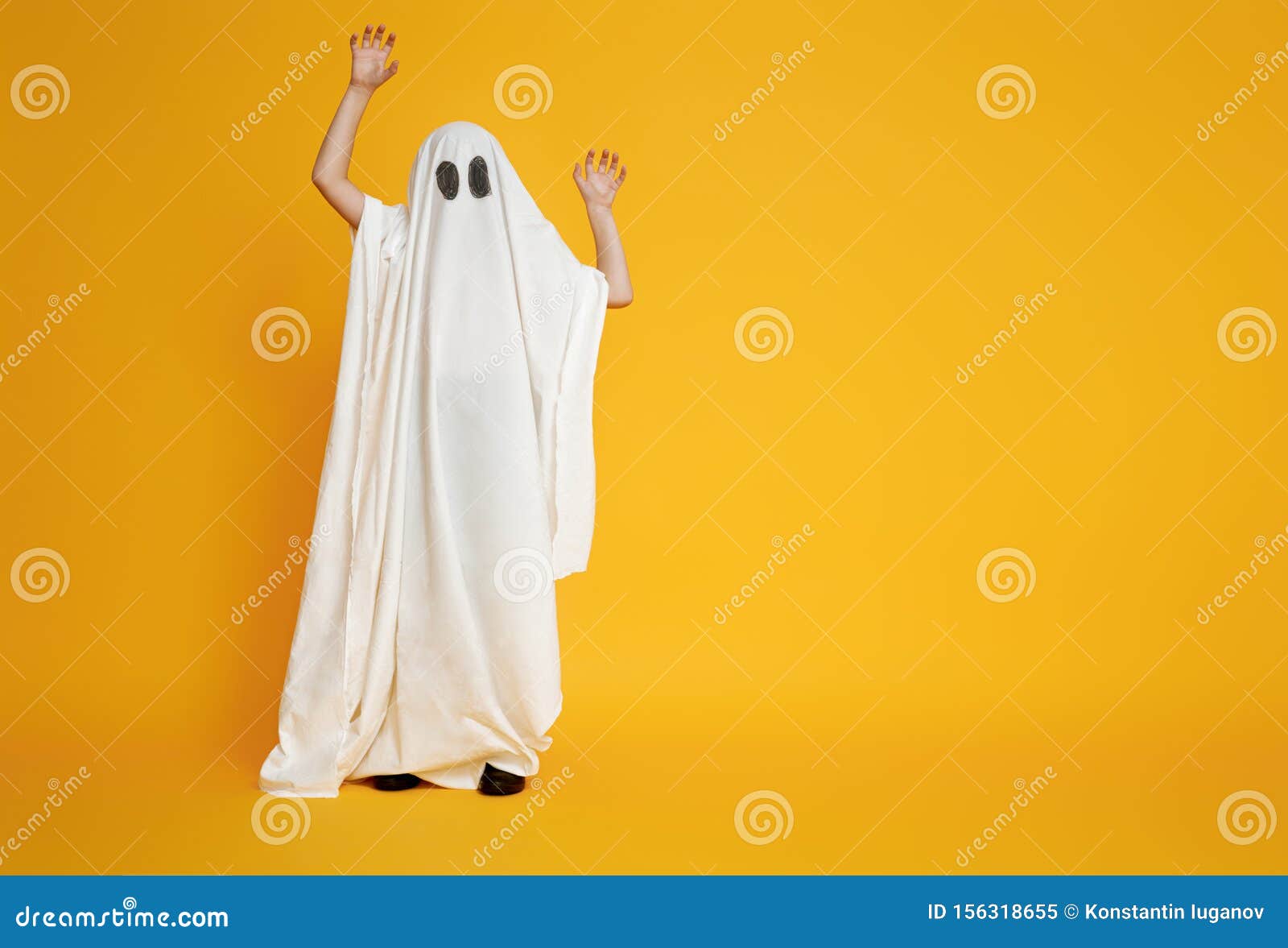 kid in ghost costume