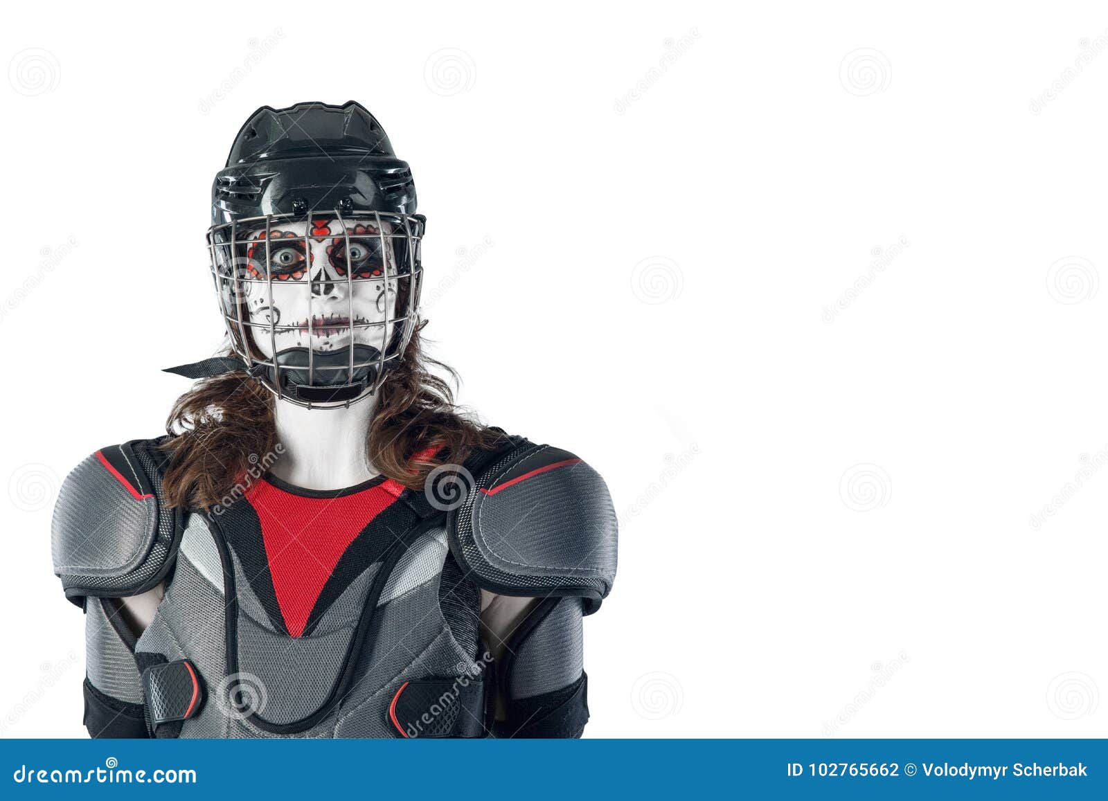Happy Halloween. Hockey Player in a Hockey Helmet and Mask Against