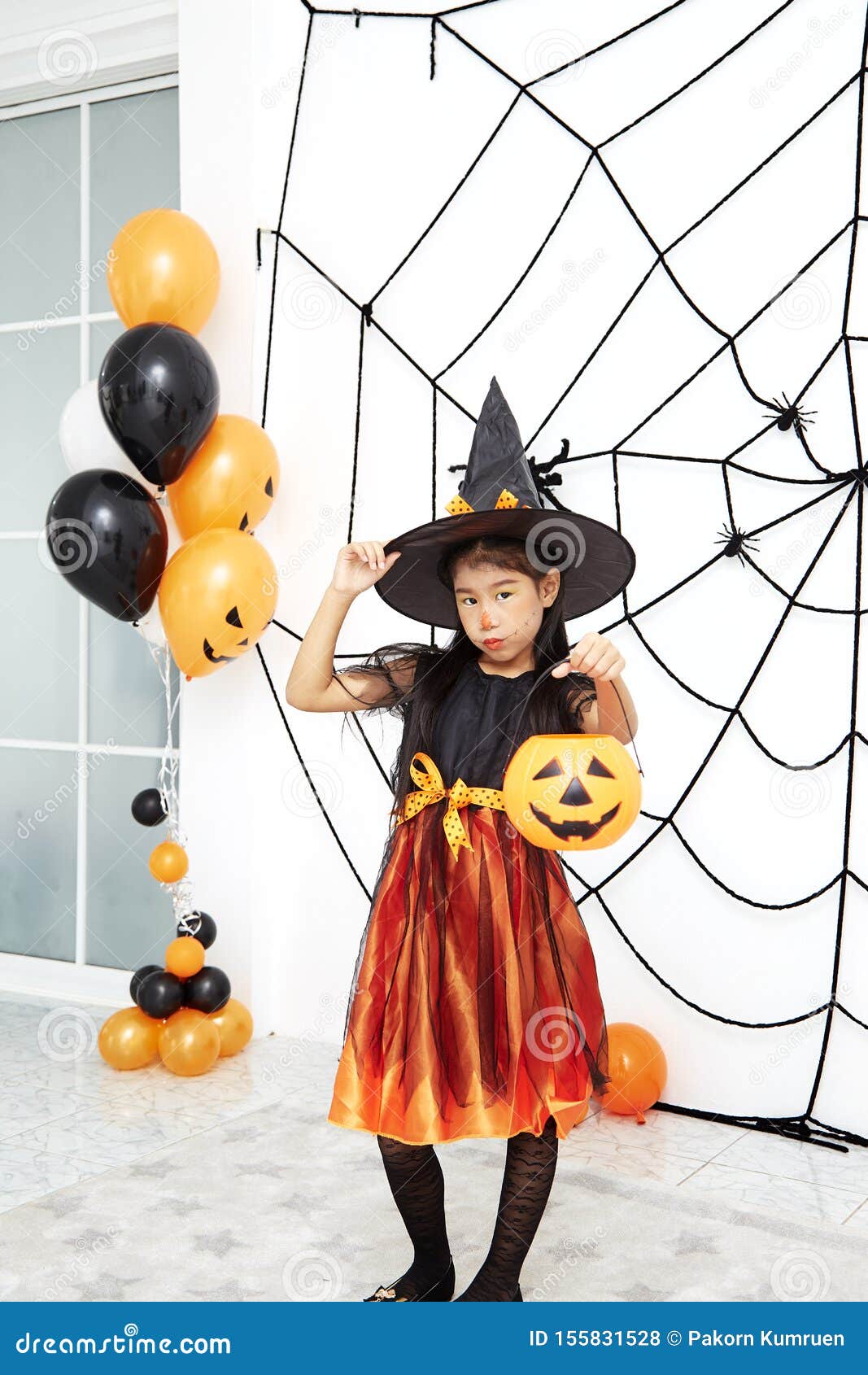 Happy Halloween Little Witch with a Pumpkin Stock Photo - Image of fall ...