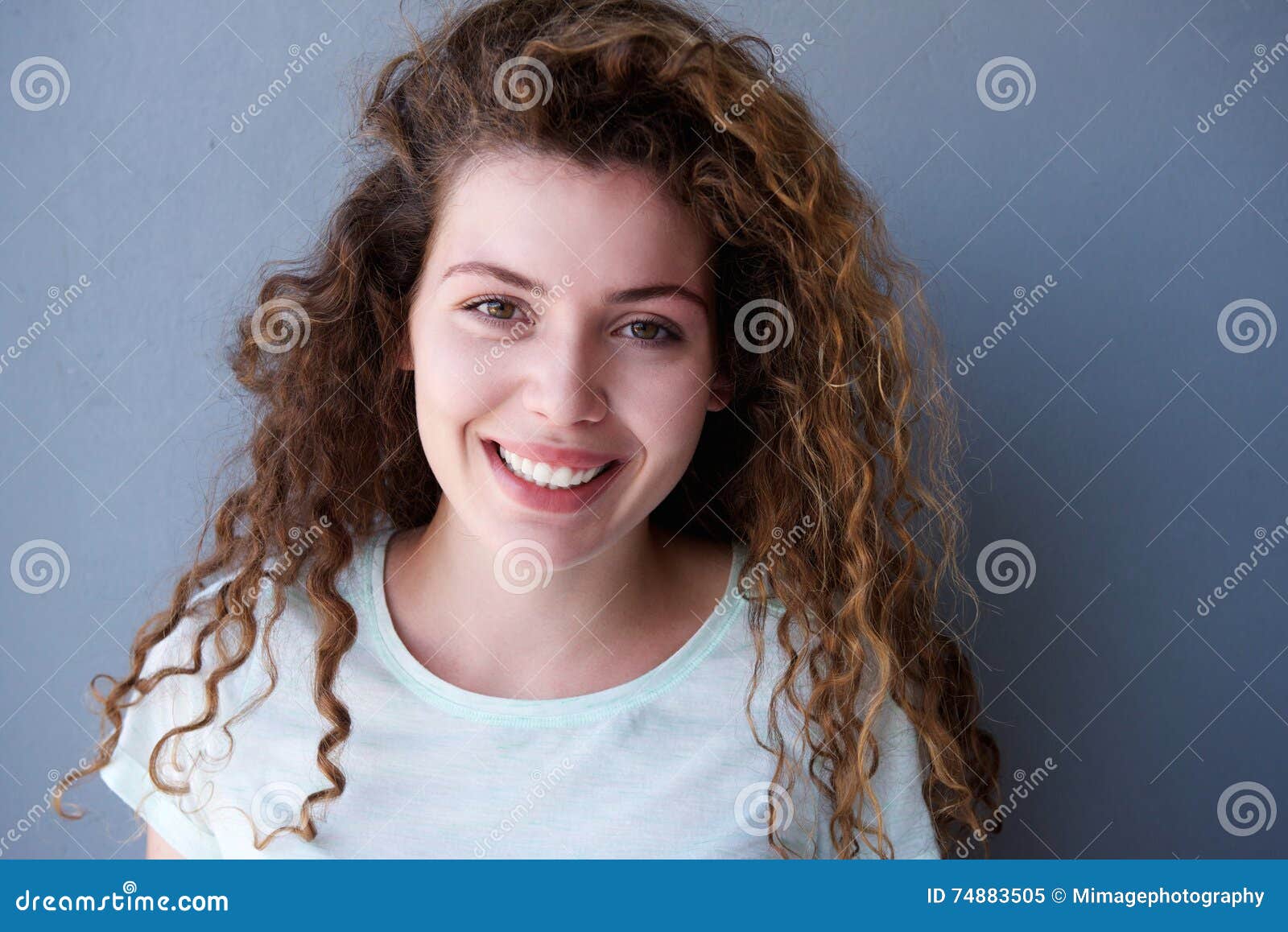 Happy And Healthy Teen Girl With Curly Hair Stock Imag