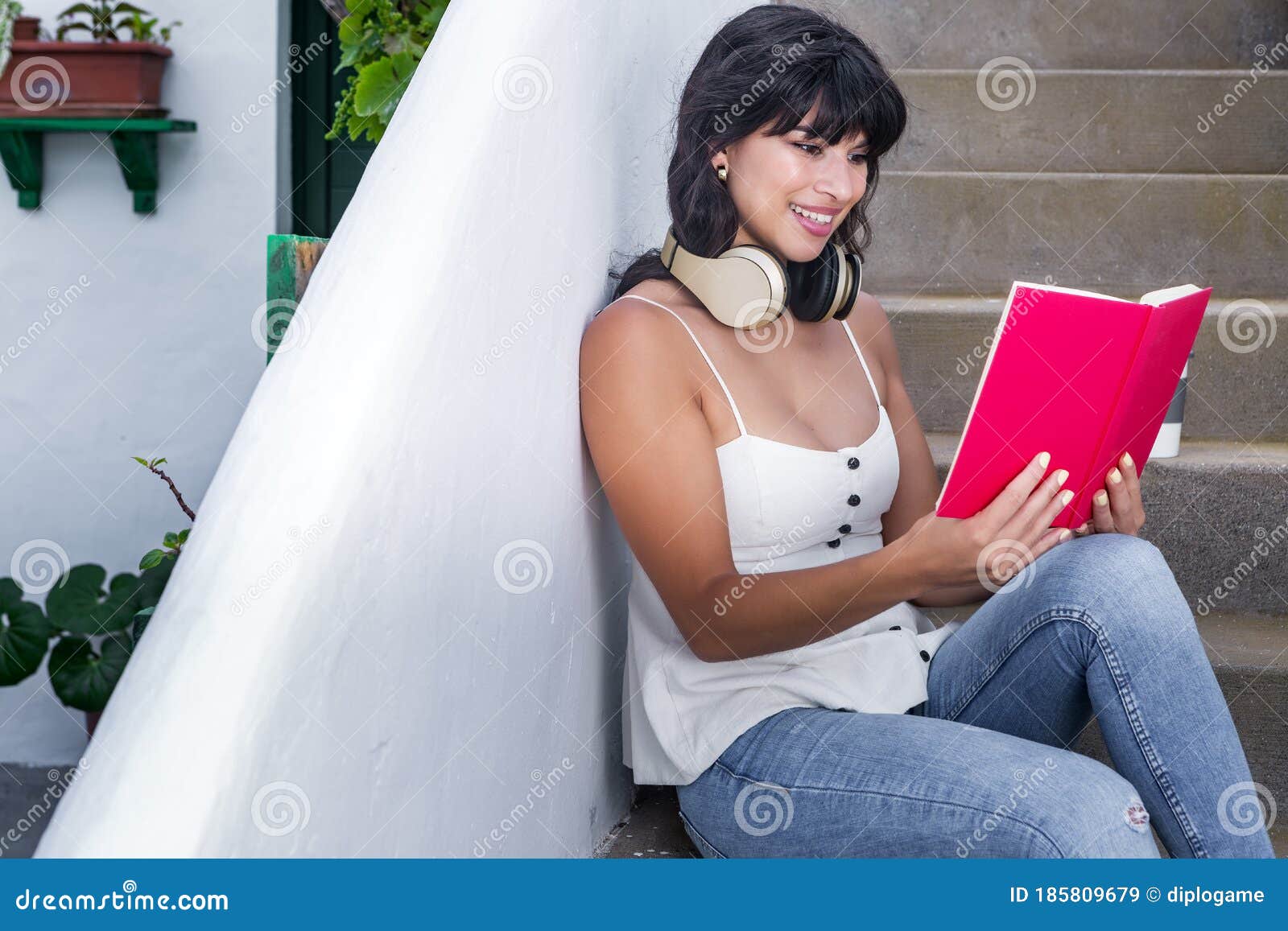 Cheerful Ethnic Female Reading Book On Steps Stock Image Image Of