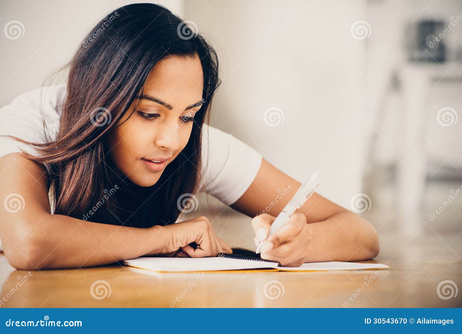 happy indian woman student education writing studying
