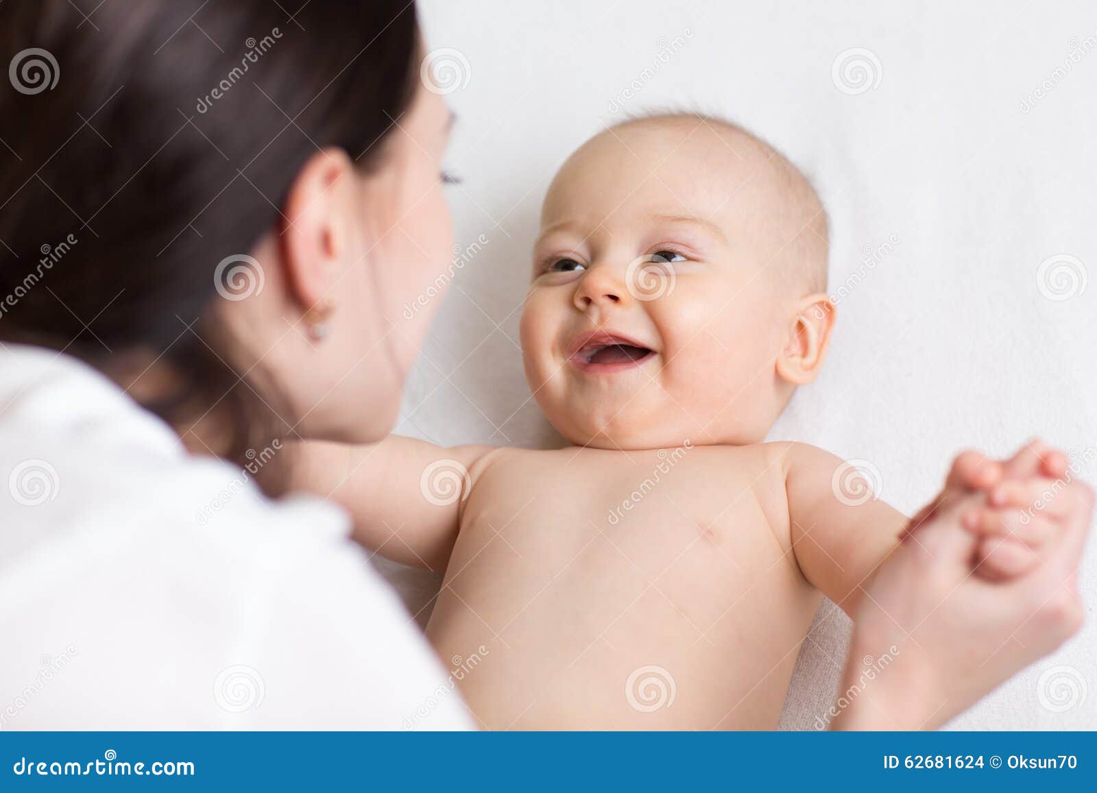 Happy Infant Baby Looking at Mom Stock Photo Image of indoors, cute