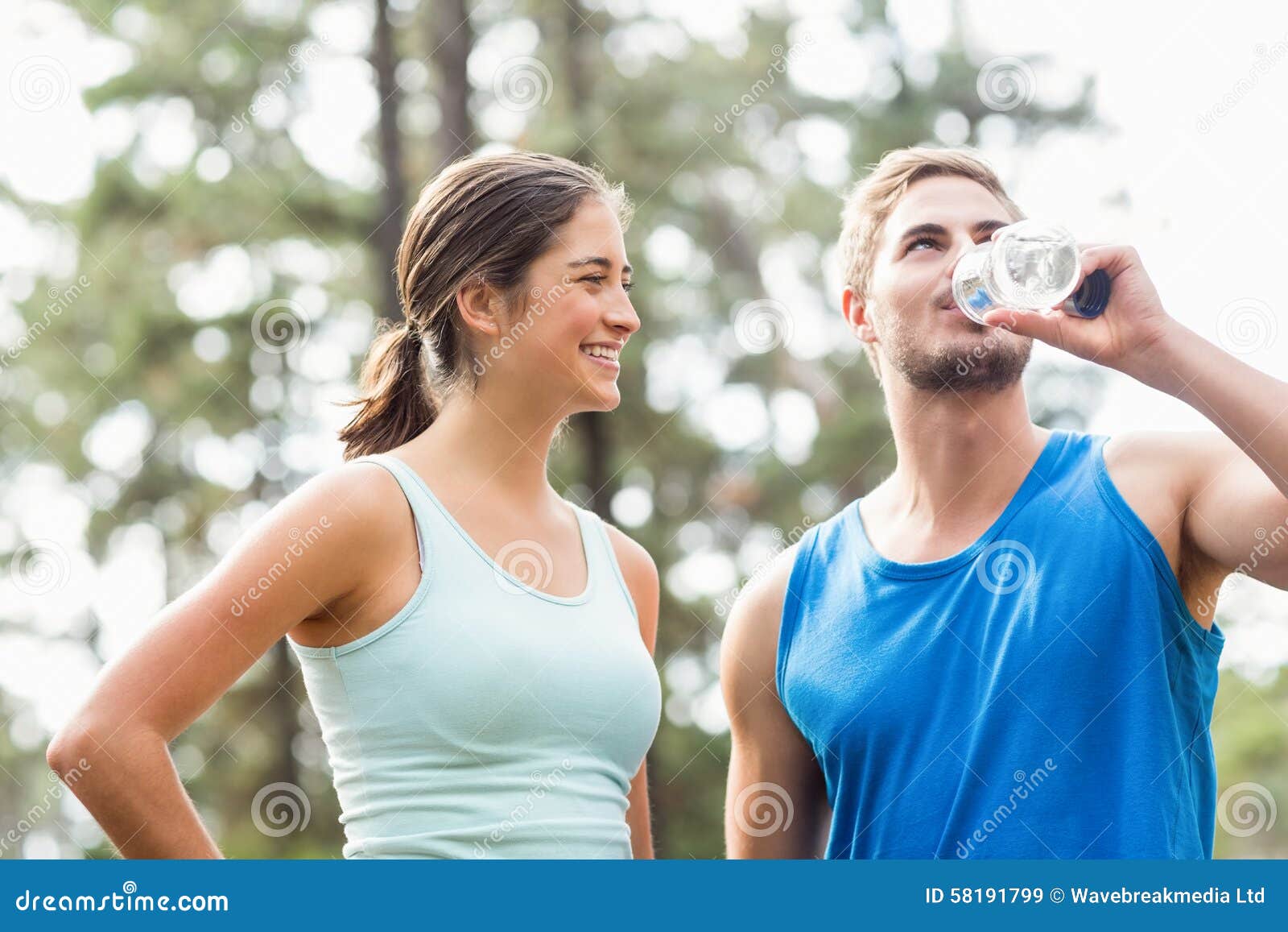 Happy Joggers Drinking Water Stock Image Image of activities, cross