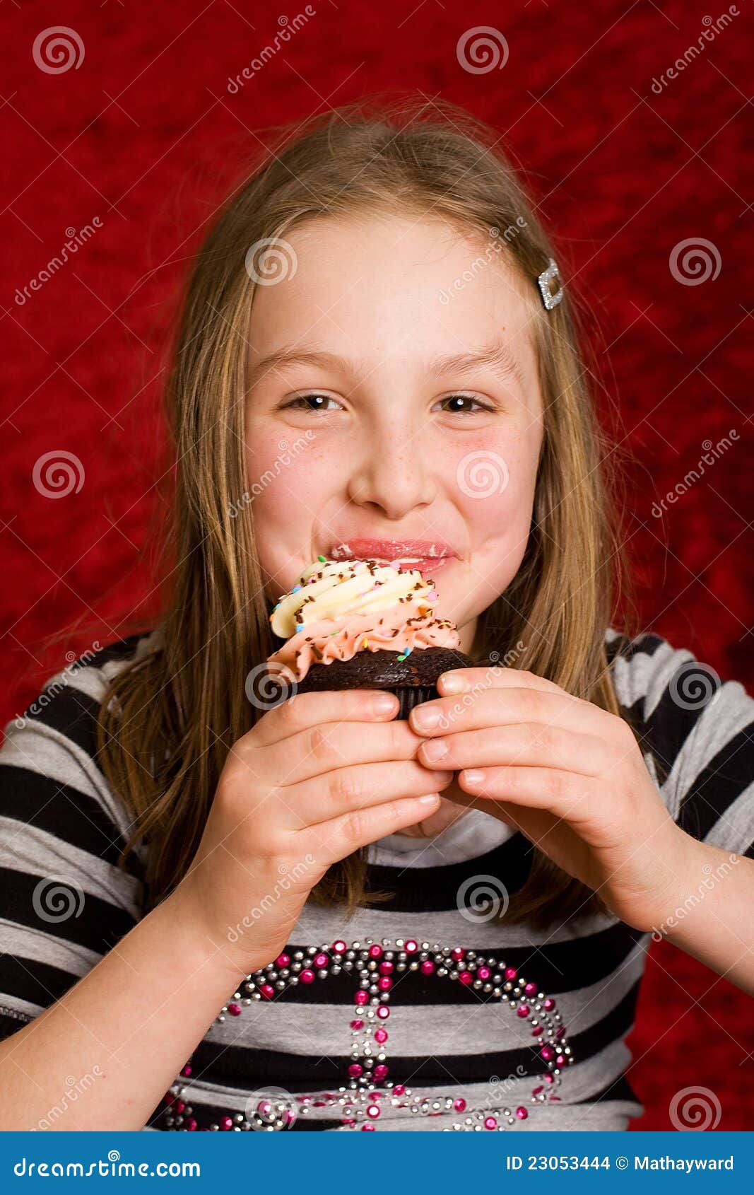 Happy kid eating a cupcake stock photo. Image of diet 23053444