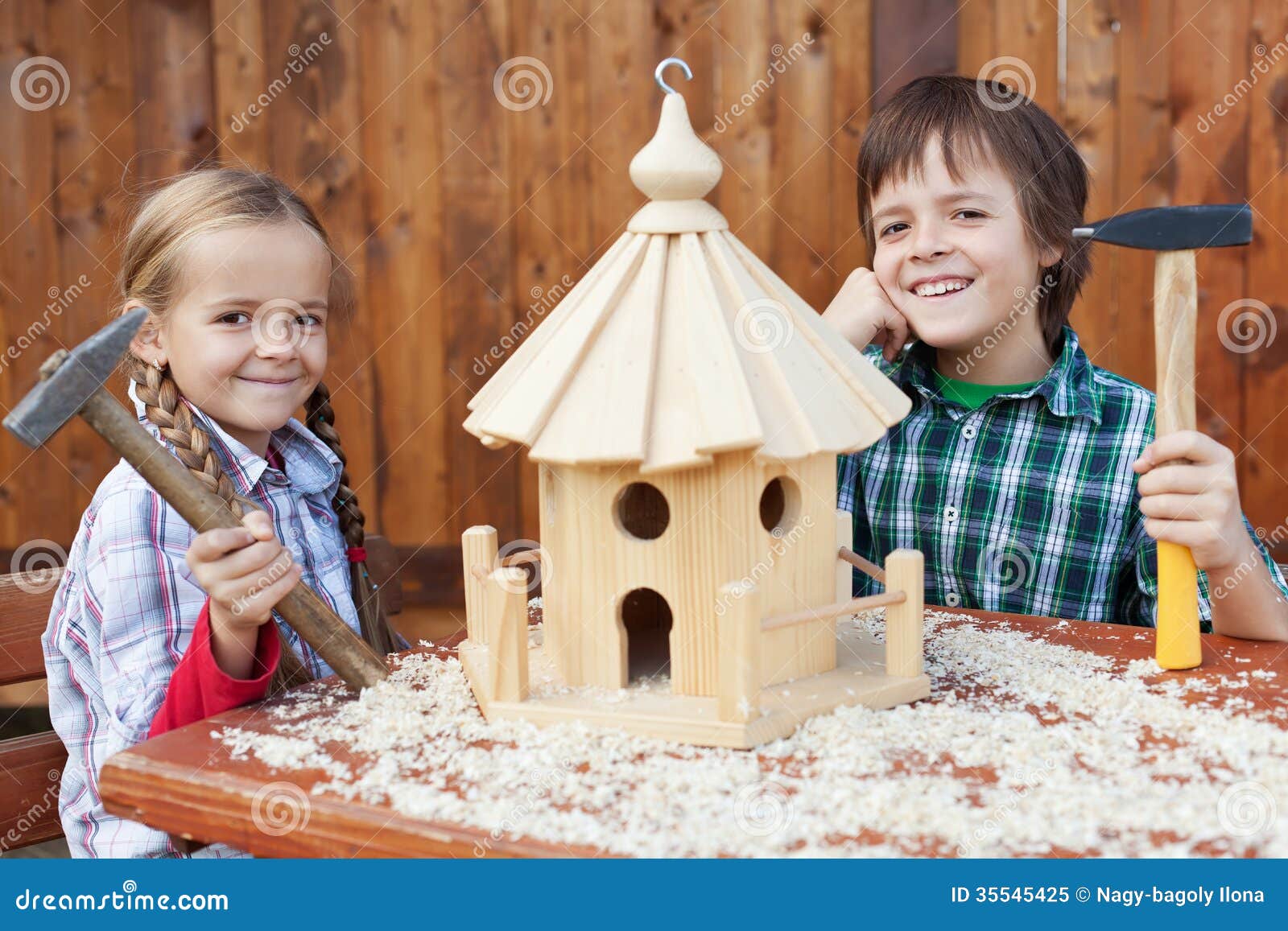 Happy Kids Building A Bird House Stock Image - Image of ...