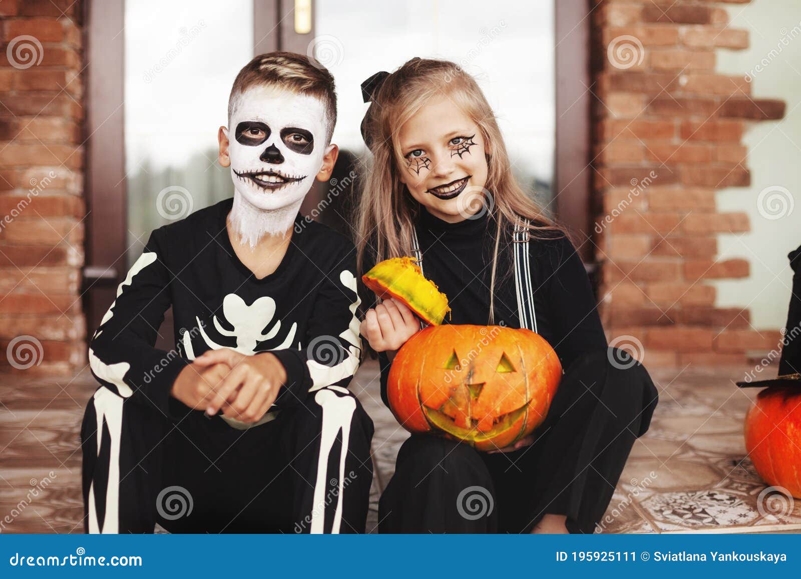 Halloween Costumes In Stock Near Me - Happy Kids Celebrate Halloween On The Street Near The House In Costumes Halloween Costumes In Stock Near Me - Happy Kids Celebrate Halloween On The Street Near The House In Costumes