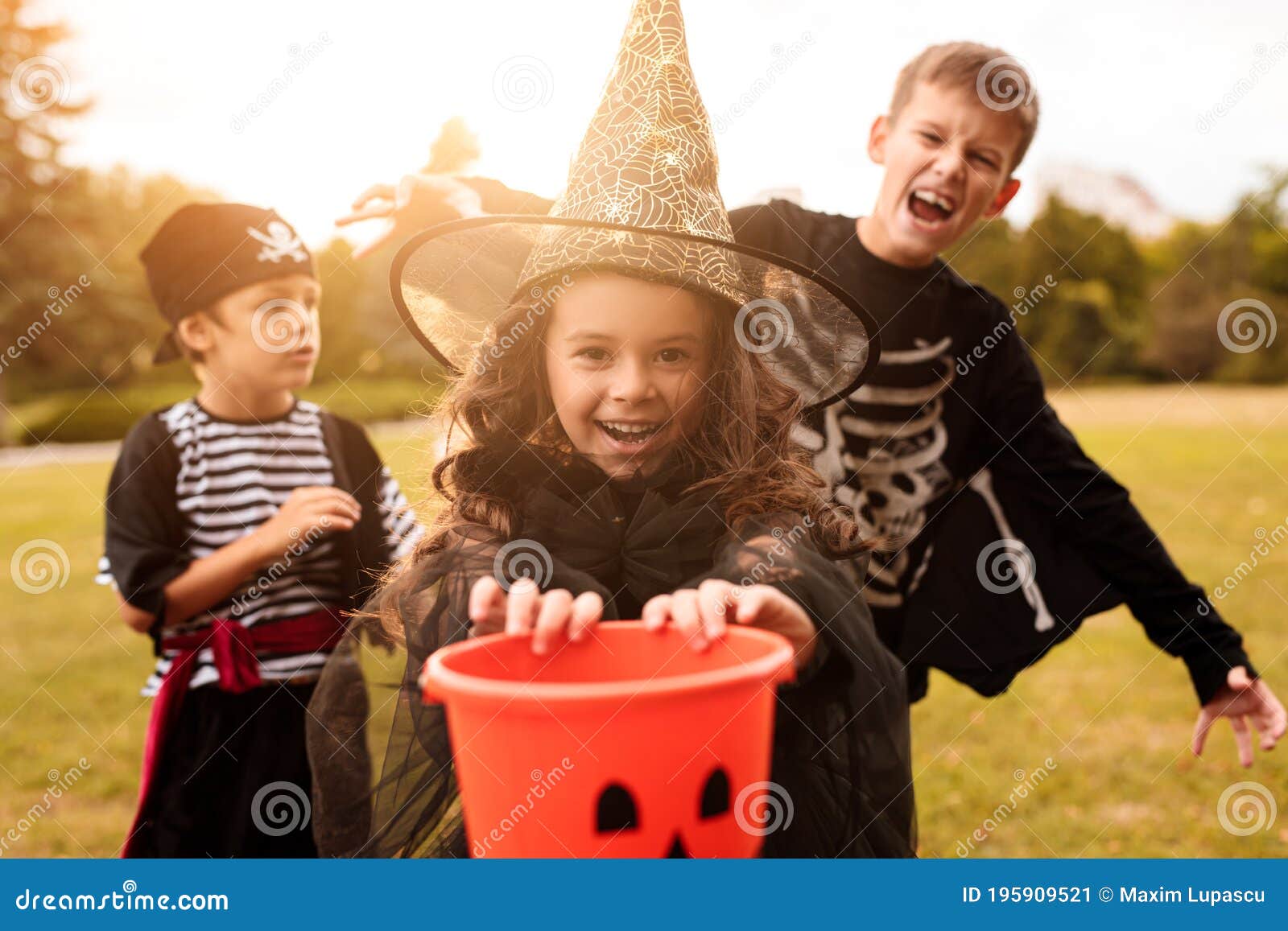 Happy Kids in Halloween Costumes with Candy Collector Stock Image ...