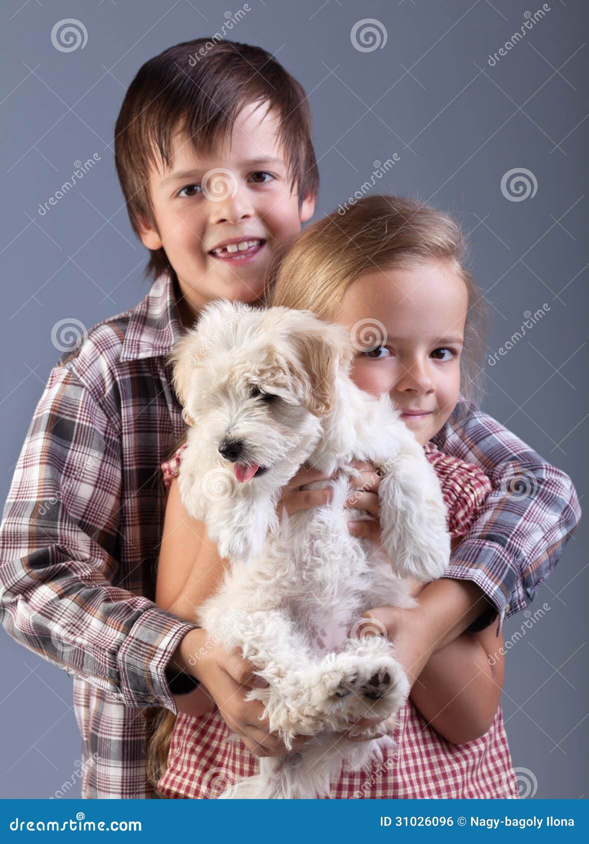 Happy Kids Holding Their New Pet Stock Photo - Image of doggy, animal ...