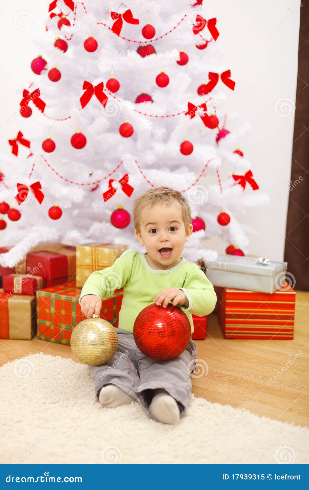 Happy Little Boy with Big Christmas Ornaments Stock Image - Image of ...