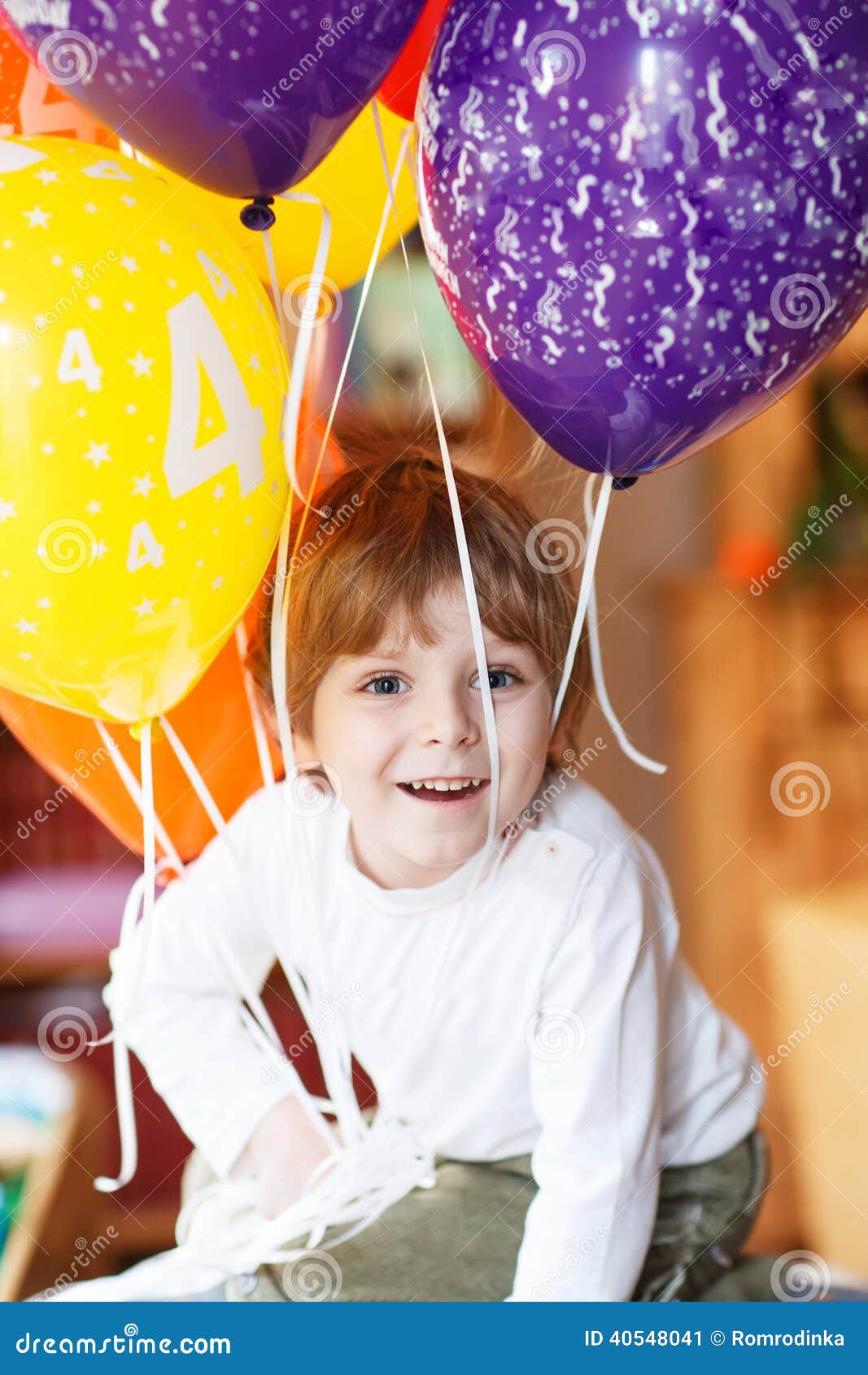 Happy Little Boy Celebrating His 4 Birthday with Colorful Balloons ...