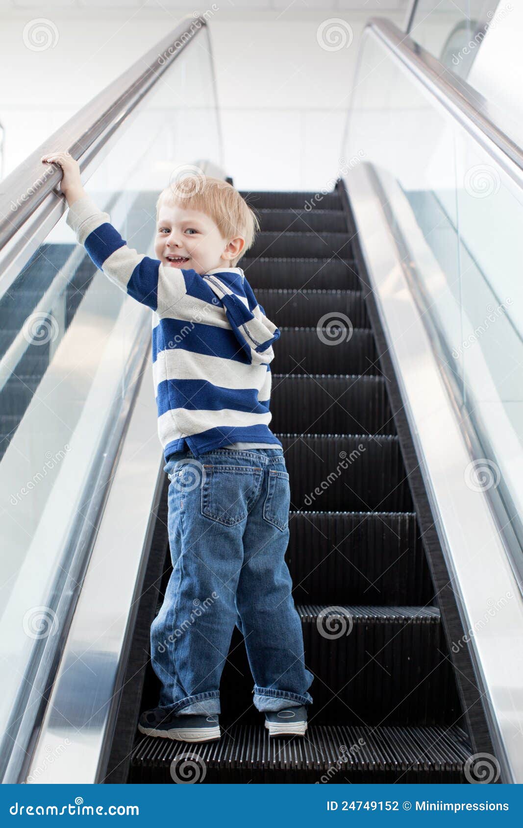 Happy Little Boy on Escalator Stock Photo Image of caucasian, store