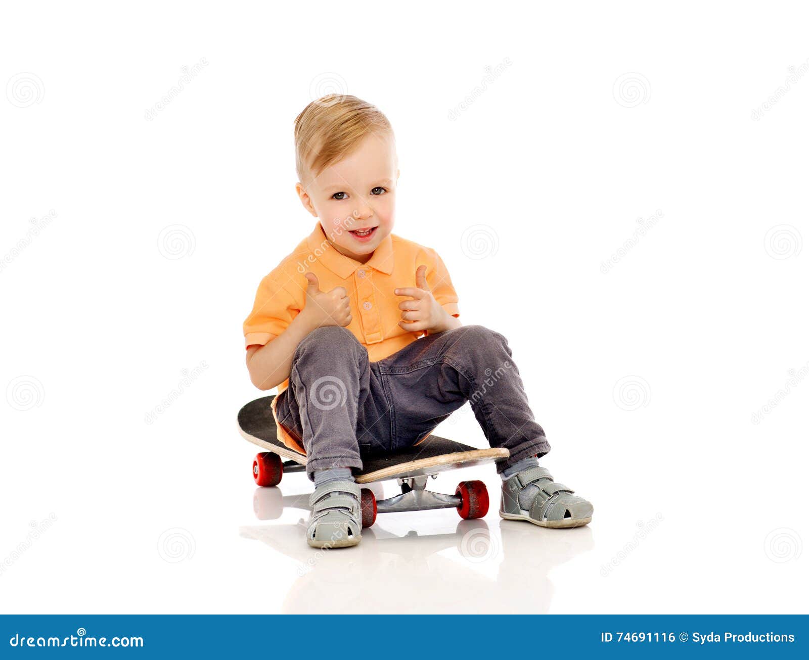 Happy Little Boy on Skateboard Showing Thumbs Up Stock Photo - Image of ...