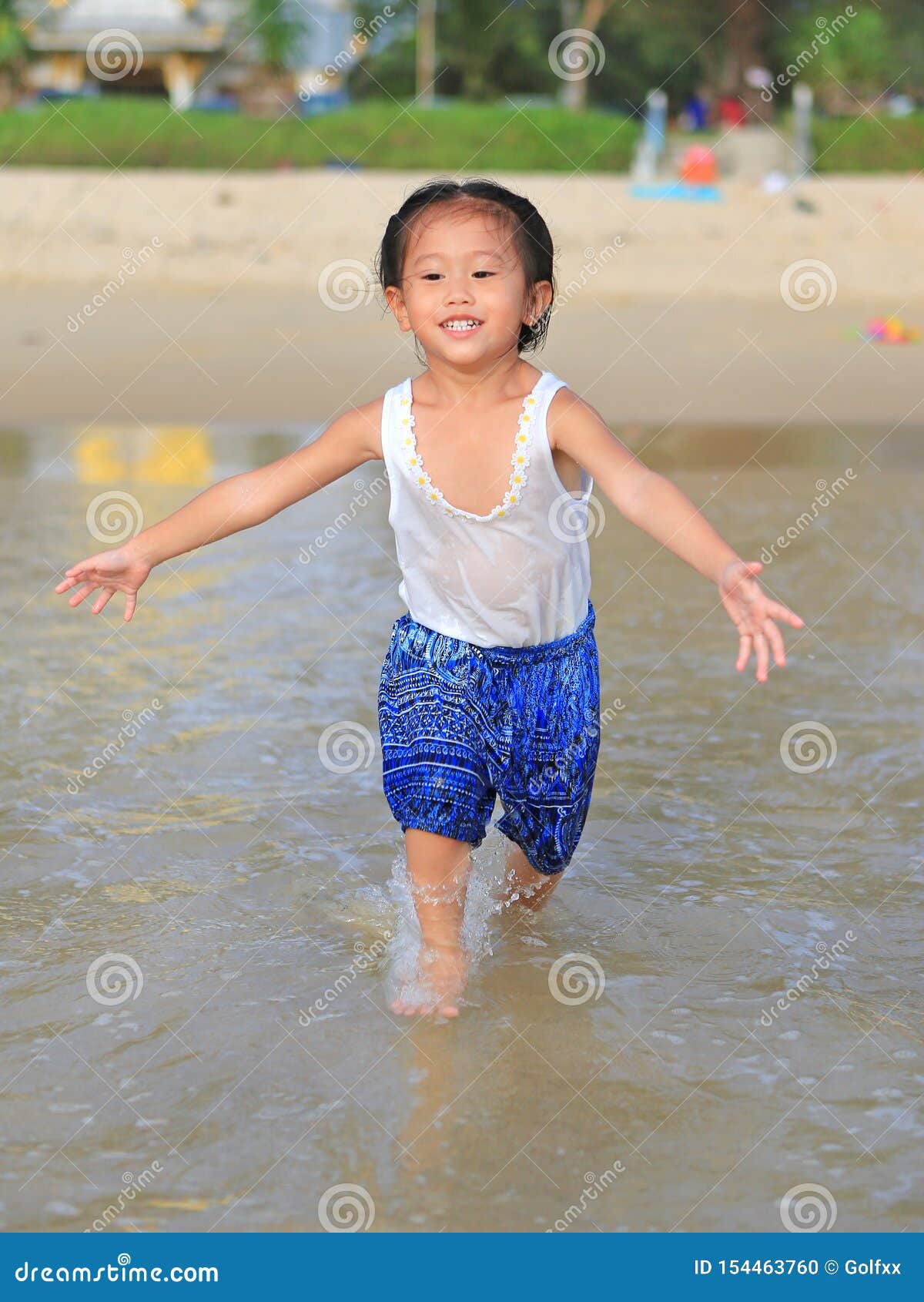 Happy Little Child Girl Running on the Beach in Summer Times Stock ...