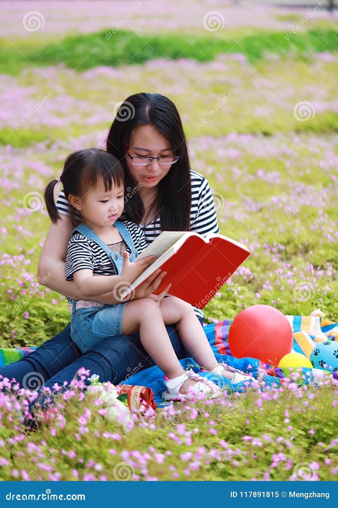 Happy Little Cute Baby Girl Smile and Read Book with Mother, Mom ...