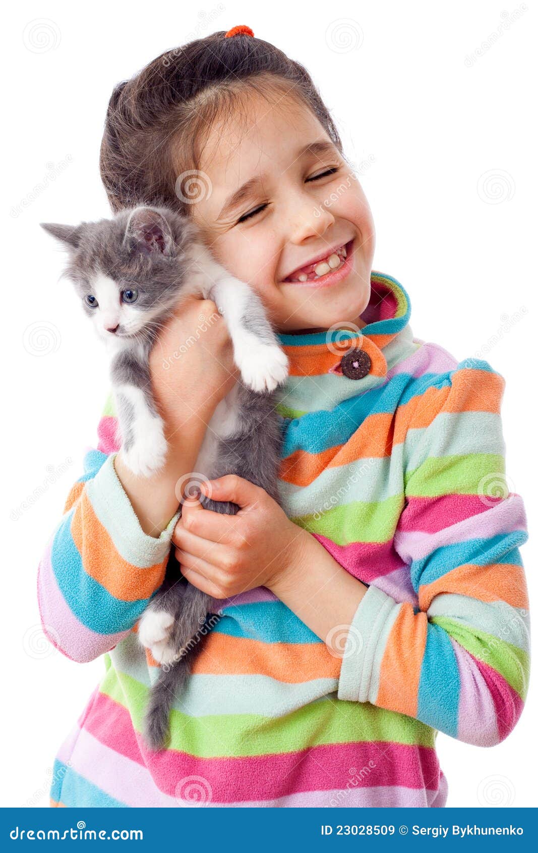 happy little girl cuddle kitten