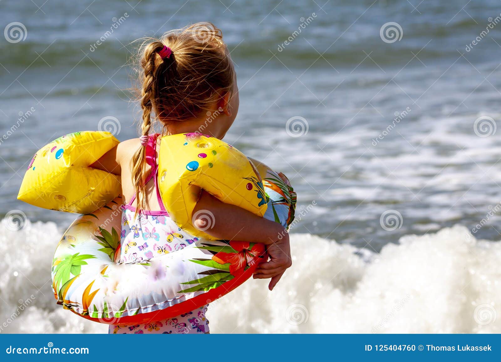 girl arm floaties