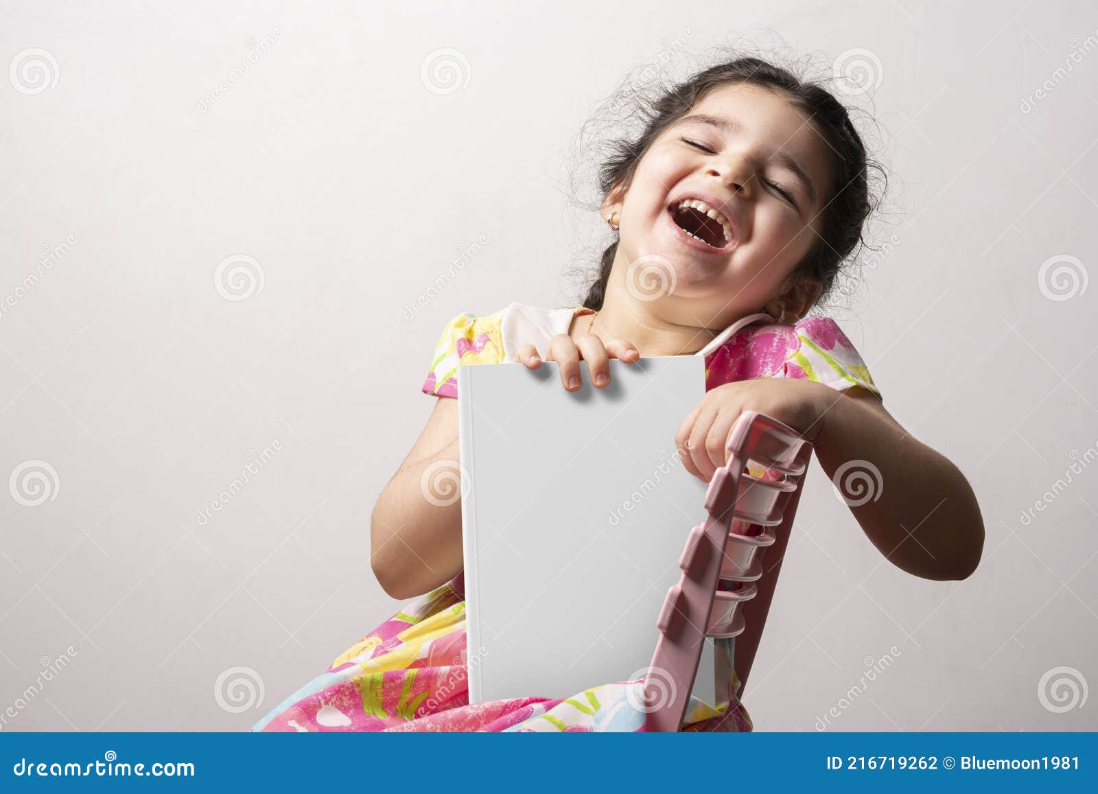 Happy Little Girl Holding a Funny Story Book with Blank Cover in Front of Body Mock-up Series Stock Photo - Image of design, novel: 216719262 Happy Little Girl Holding a Funny Story Book with Blank Cover in Front of Body Mock-up Series Stock Photo - Image of design, novel: 216719262