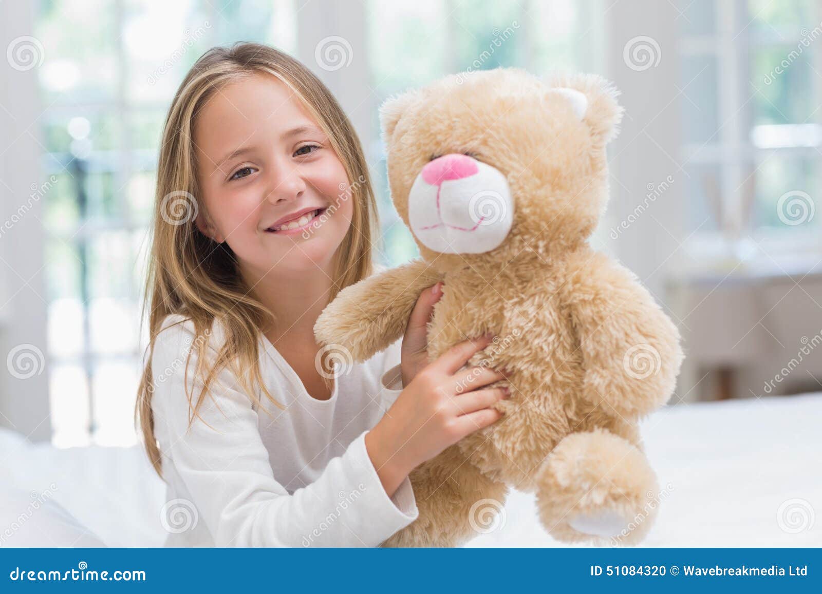 Happy Little Girl Holding Her Teddy Stock Photo - Image of lifestyle ...