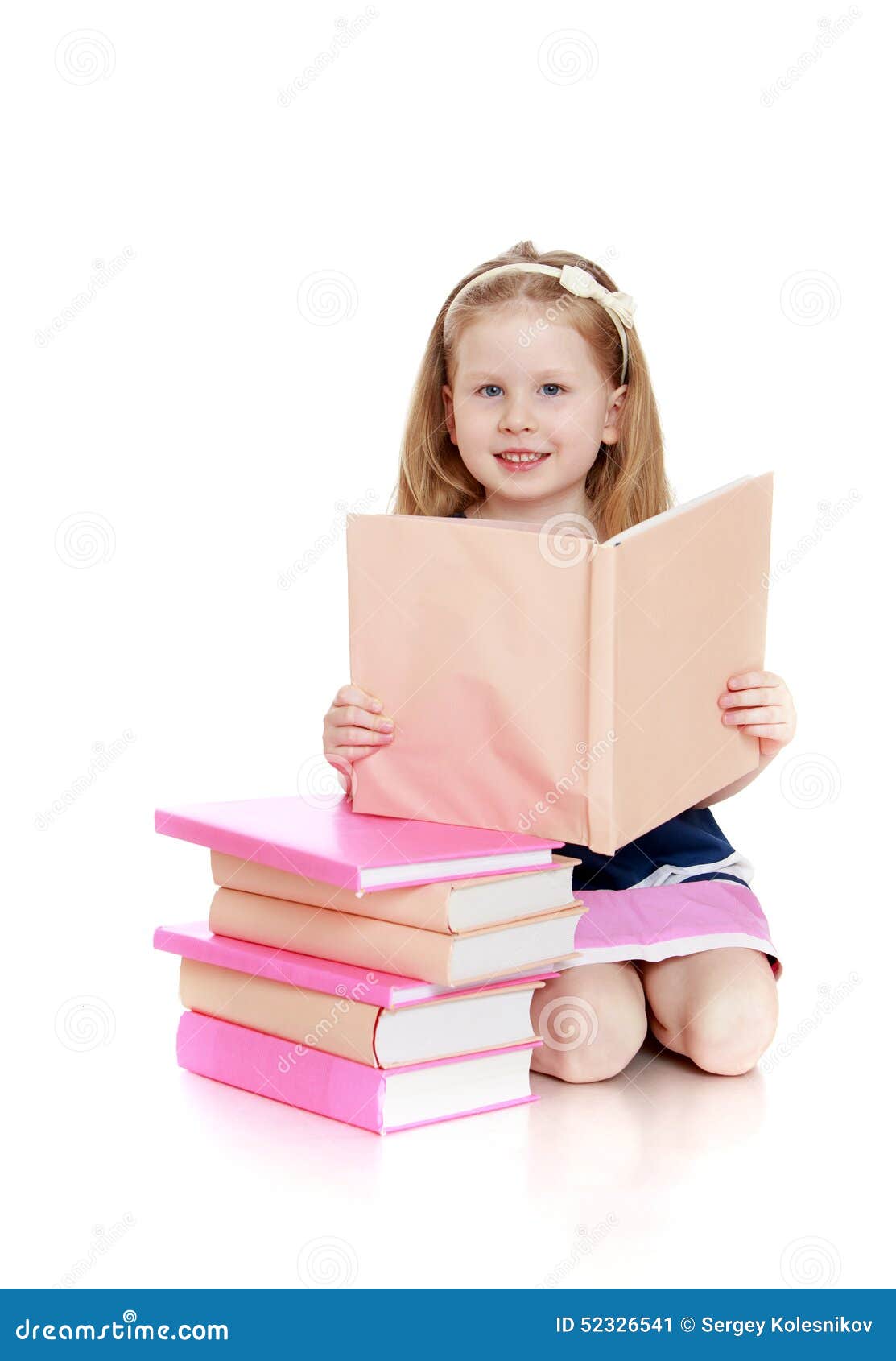 Happy Little Girl Reading A Book On Her Knees Stock Image ...