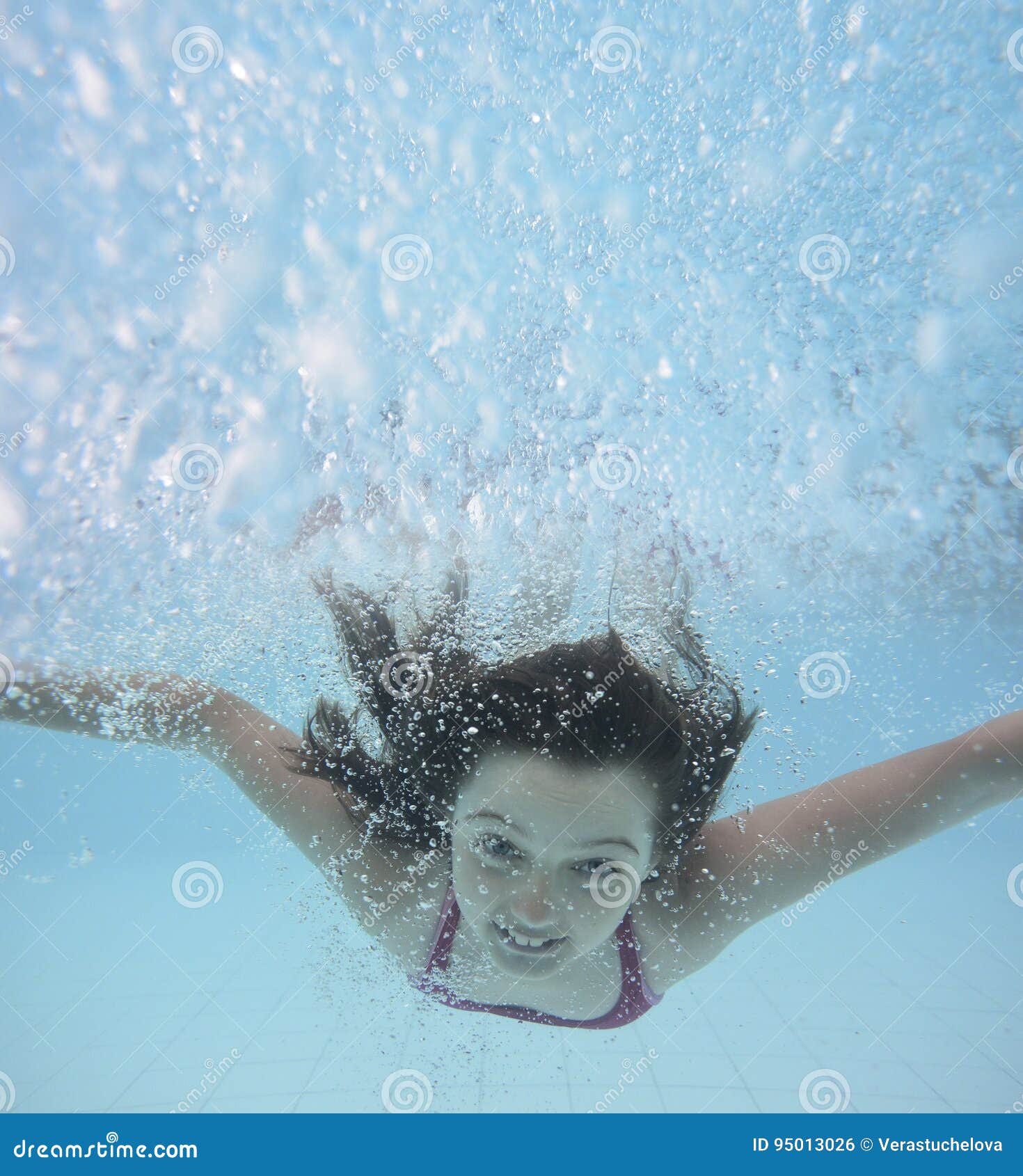 A Happy Little Girl Swimming in a Pool Stock Photo - Image of happy ...