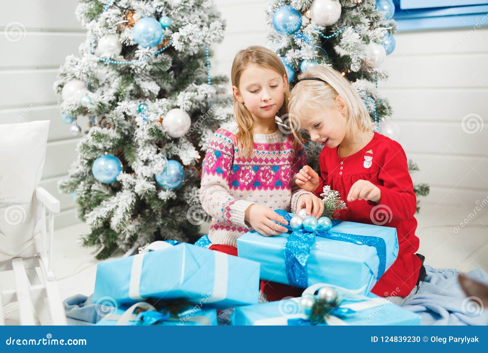 Happy Little Kids Opening Presents on Christmas Eve Stock Photo  Image