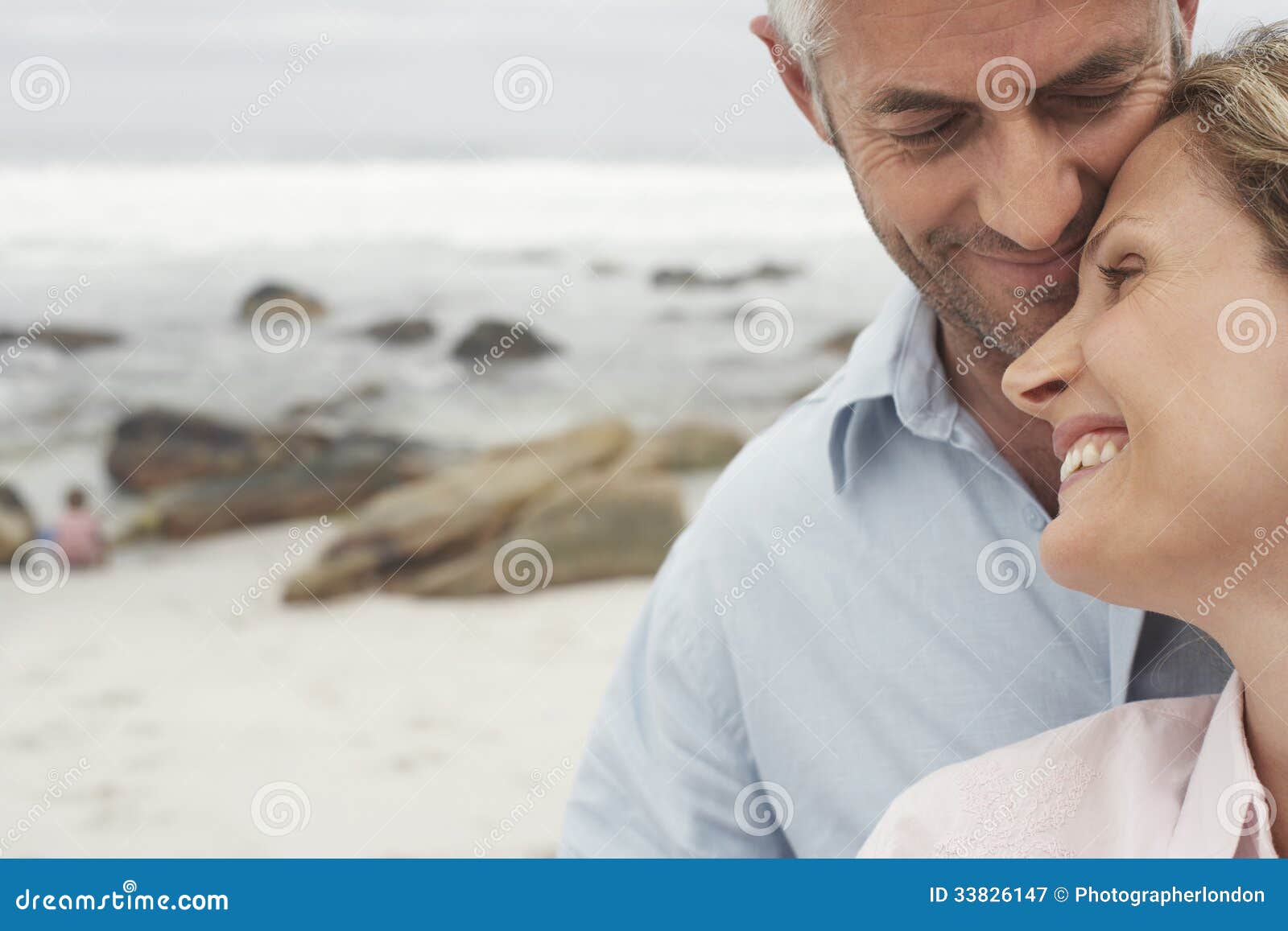 happy loving couple at beach