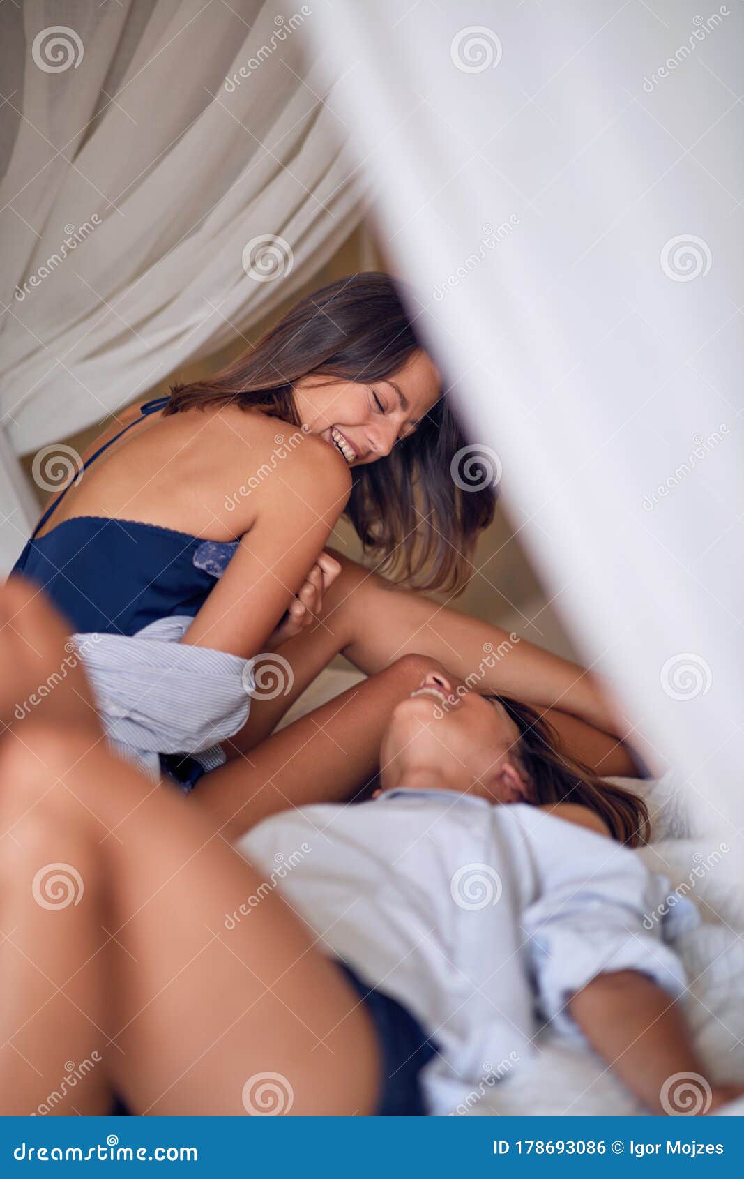 Lesbians Hot Kiss On Bed