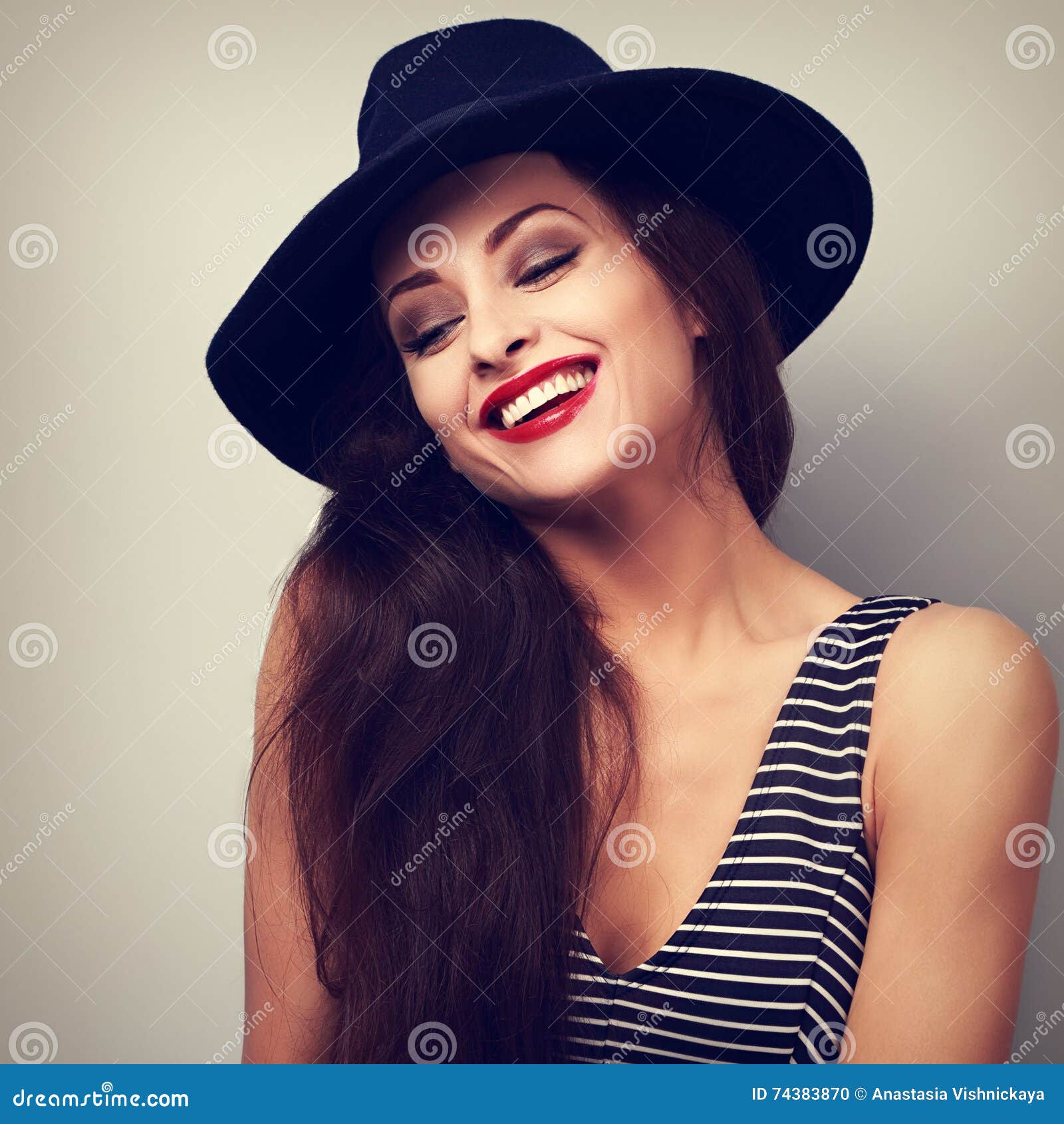 Happy Makeup Laughing Female Model in Black Elegant Hat. Toned C Stock ...