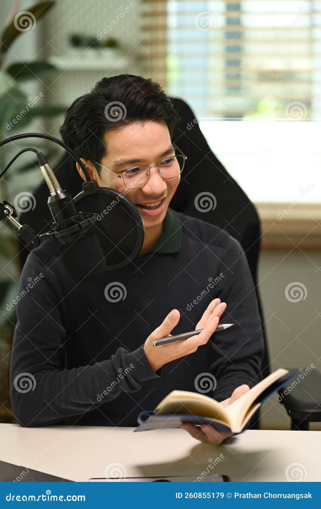 Happy Male Podcasters Using Condenser Microphone, Recording Podcast