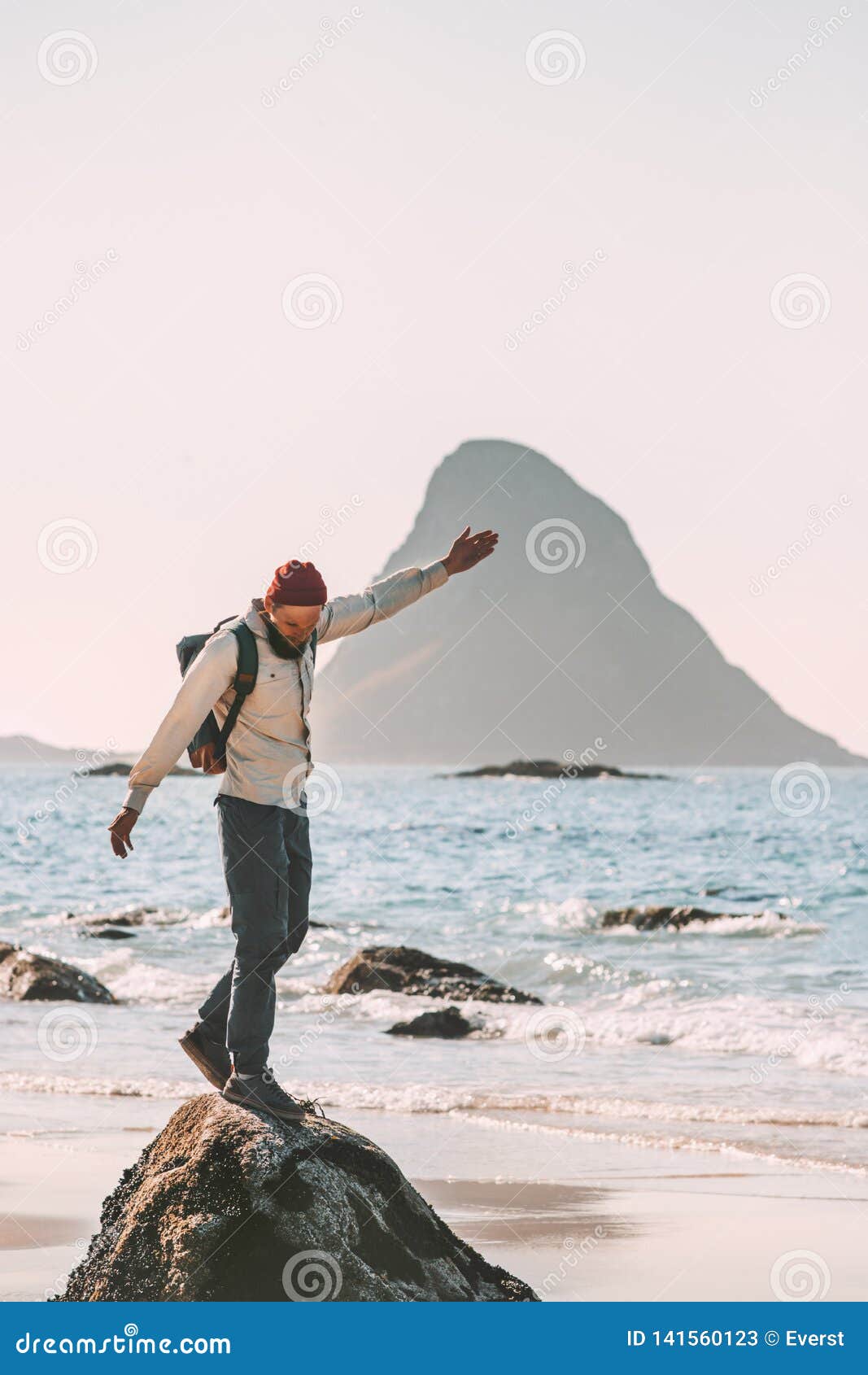 happy man enjoying ocean beach traveling active lifestyle