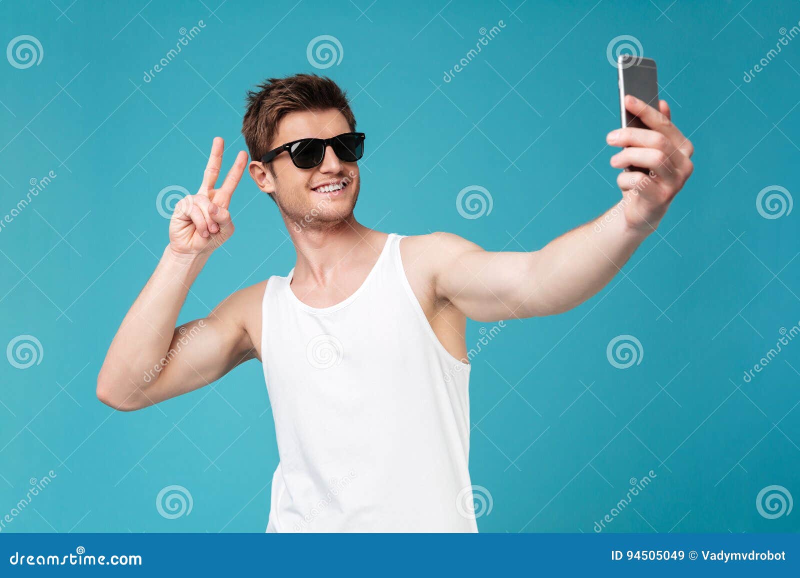 Happy Man Make Selfie by Phone Showing Peace Gesture. Stock Image ...