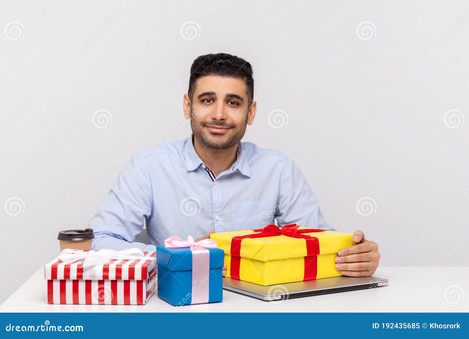 Happy Man Office Employee Sitting Workplace Surrounded by Gift Boxes and  Smiling Friendly, Enjoying Presents Stock Image - Image of celebrate,  celebration: 192435685