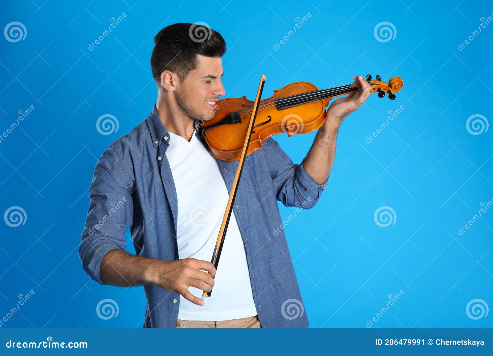 Happy Man Playing Violin on Light Blue Background Stock Image Image