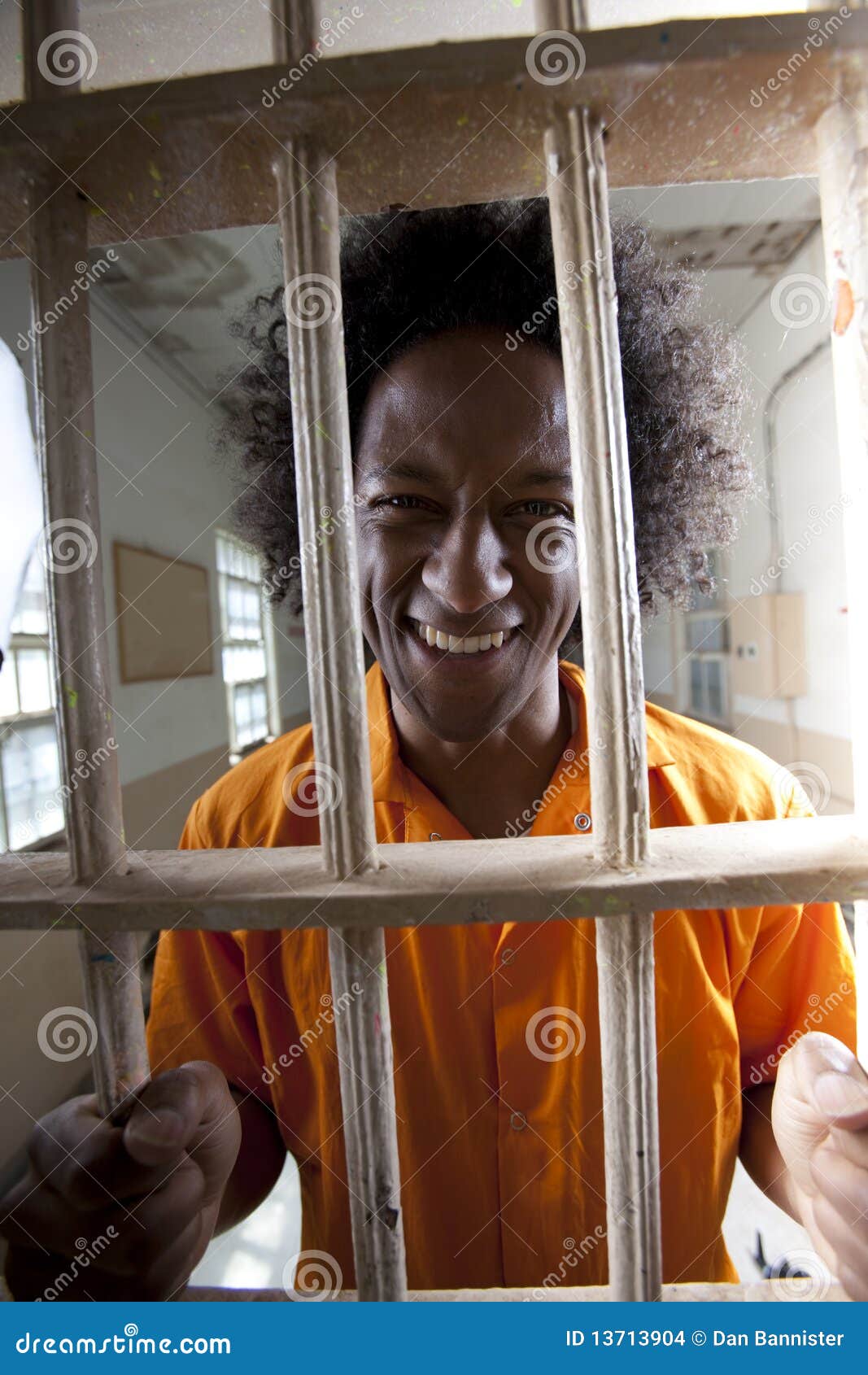 Happy Man in Prison Cell stock photo. Image of behind - 13713904