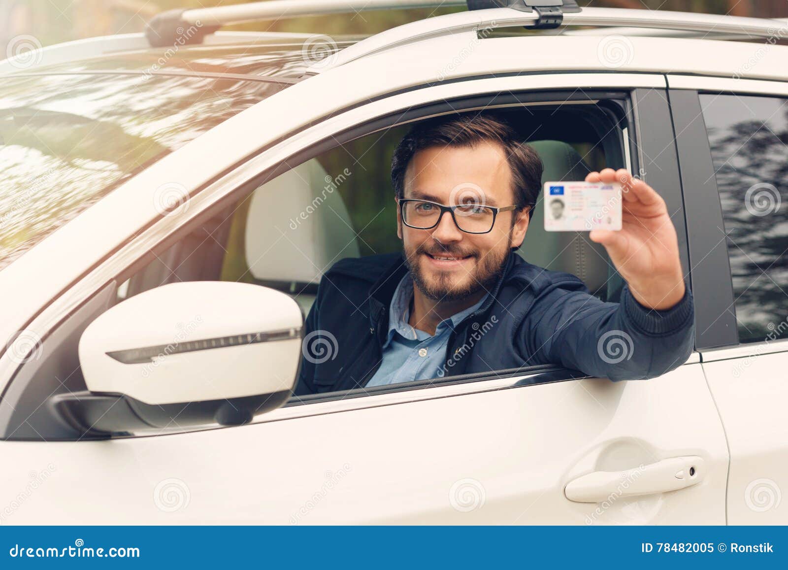 Happy Man Showing His New Driver License Stock Image Image of glasses