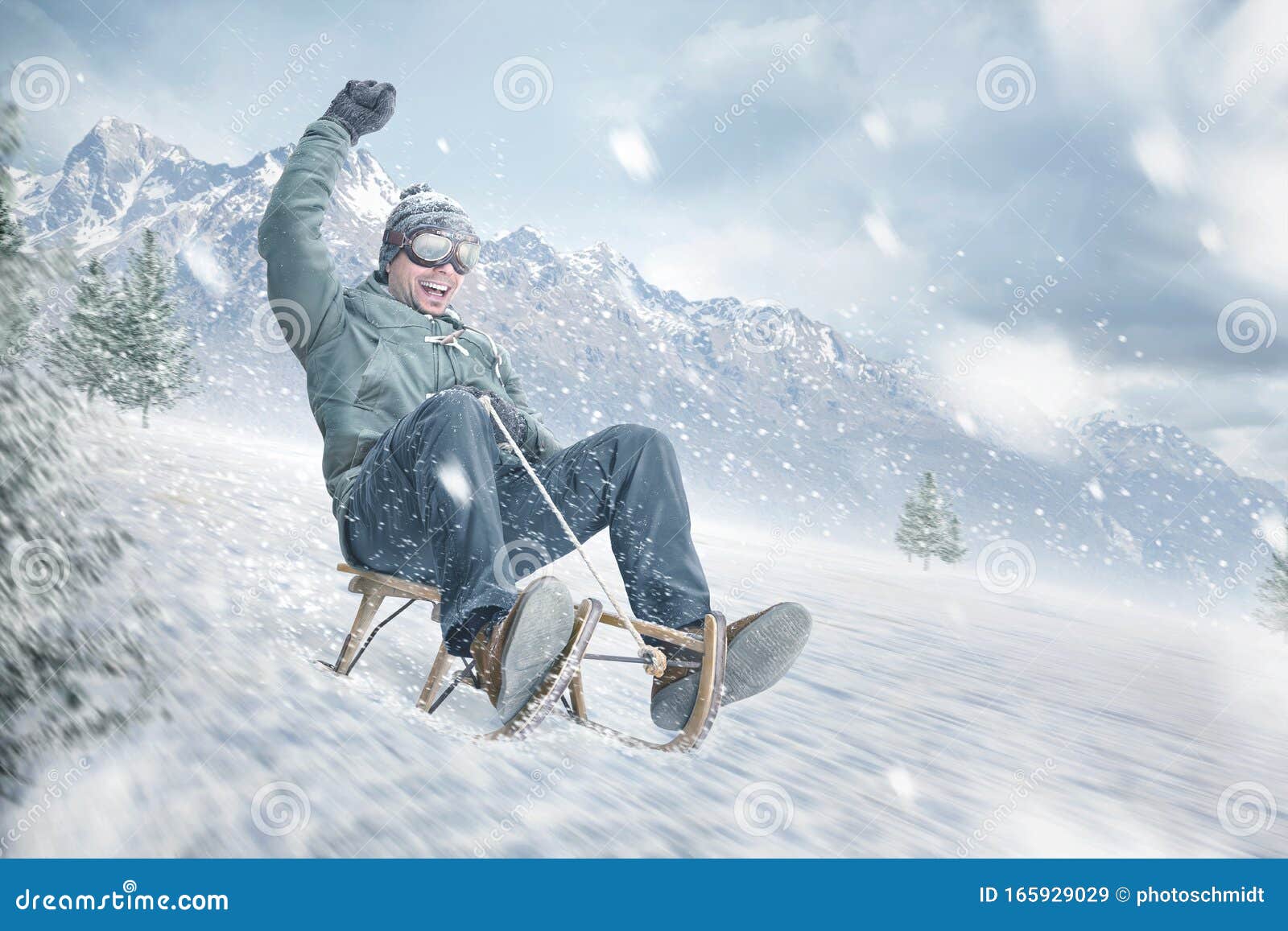 Happy Man Sledding Down a Slope in Winter Stock Image Image of winter
