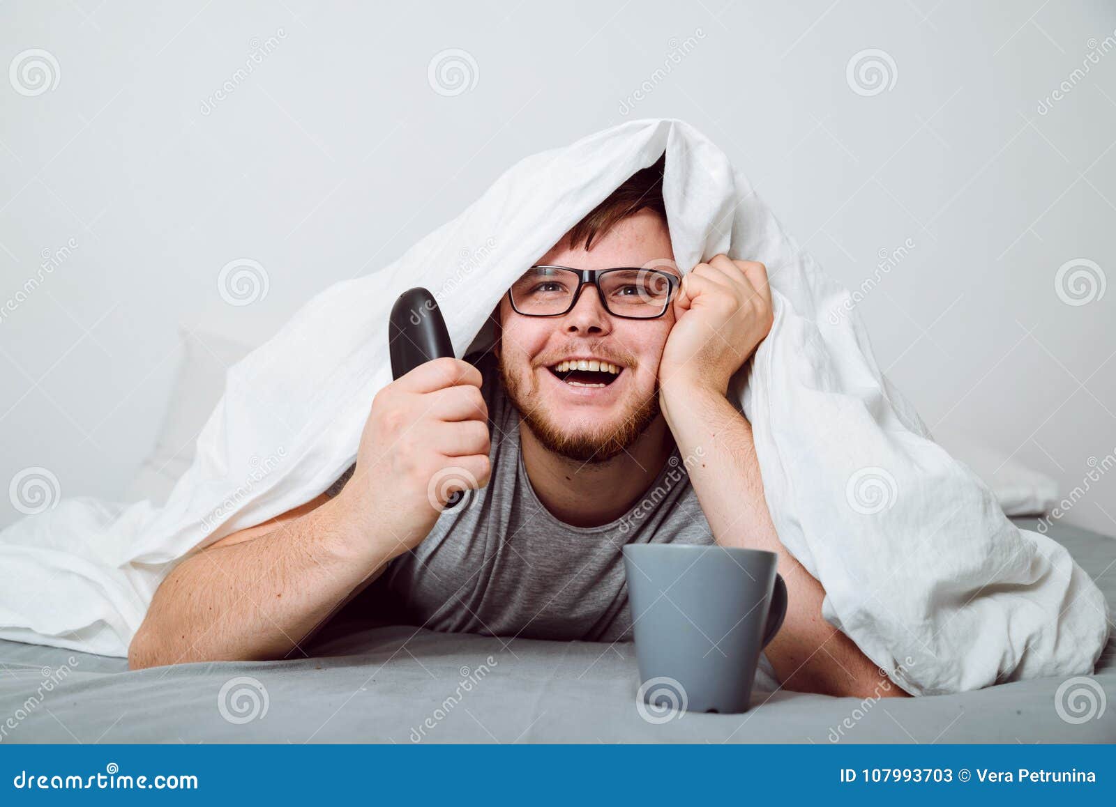 Happy Man Watch TV Under Blanket Stock Image Image of pretty, home