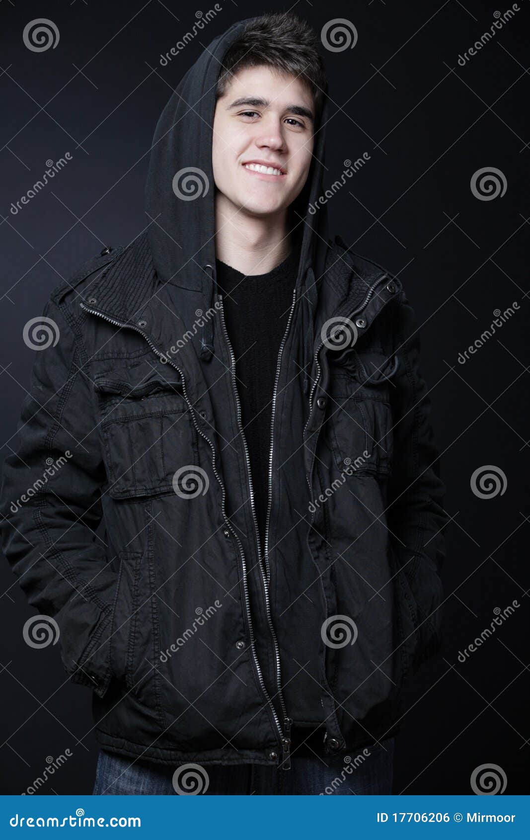 Happy Man Wearing Black Jacket With Hood. Royalty Free 